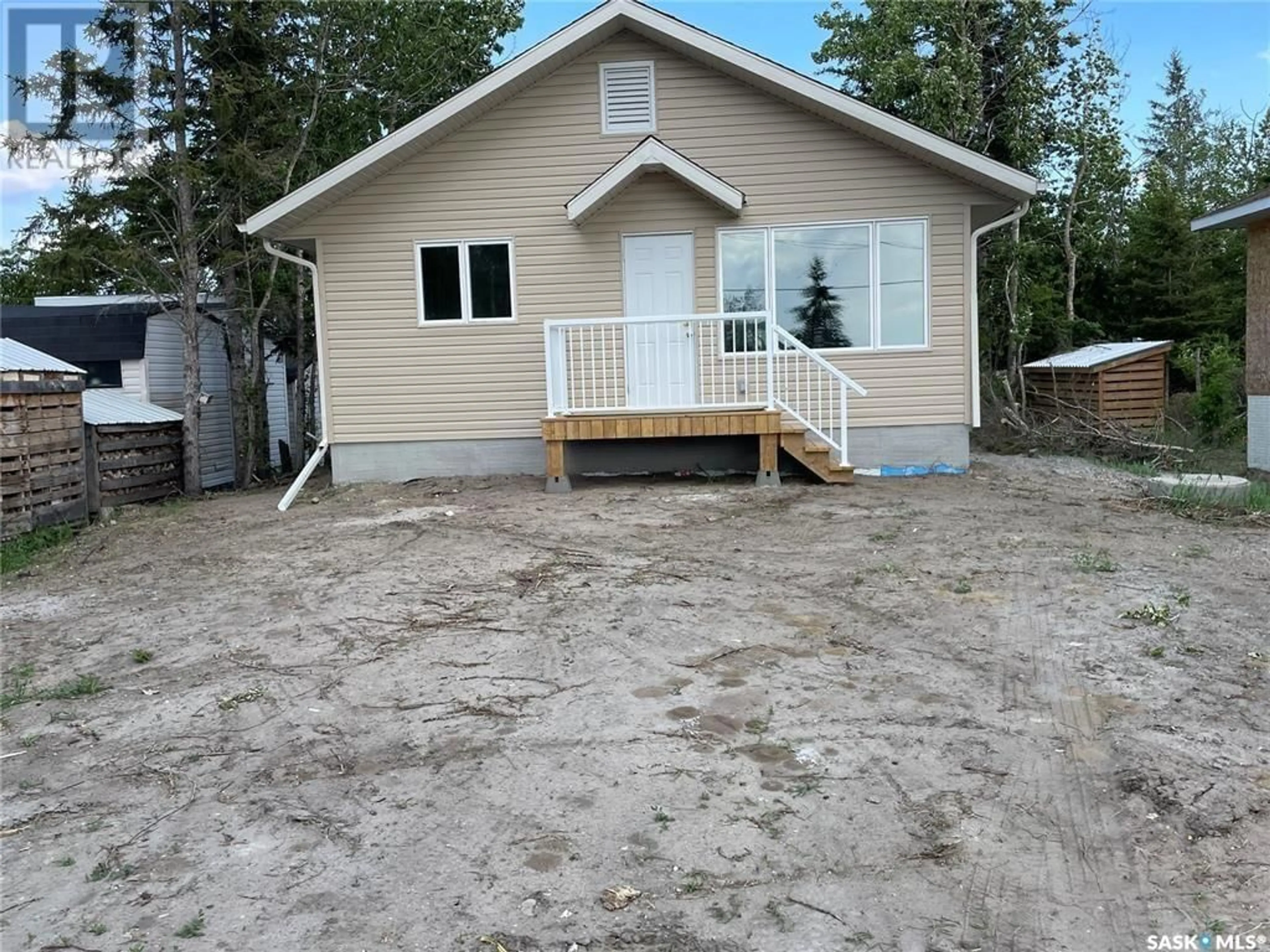 Home with vinyl exterior material, street for 1121 DEERFOOT TRAIL, Good Spirit Lake Saskatchewan S0A0L0