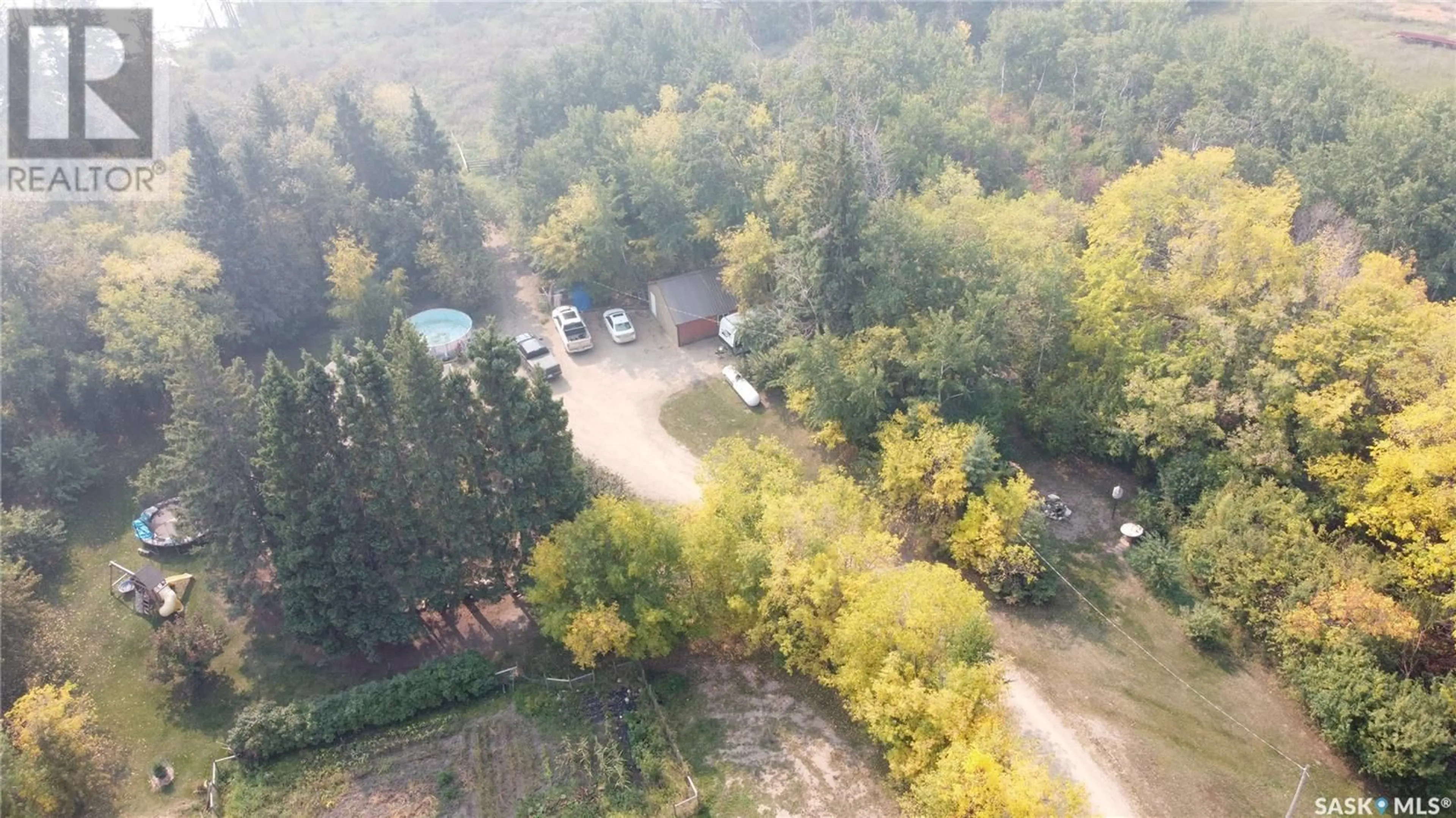 A pic from outside/outdoor area/front of a property/back of a property/a pic from drone, forest/trees view for FORREST ACREAGE, Leask Rm No. 464 Saskatchewan S0J1M0