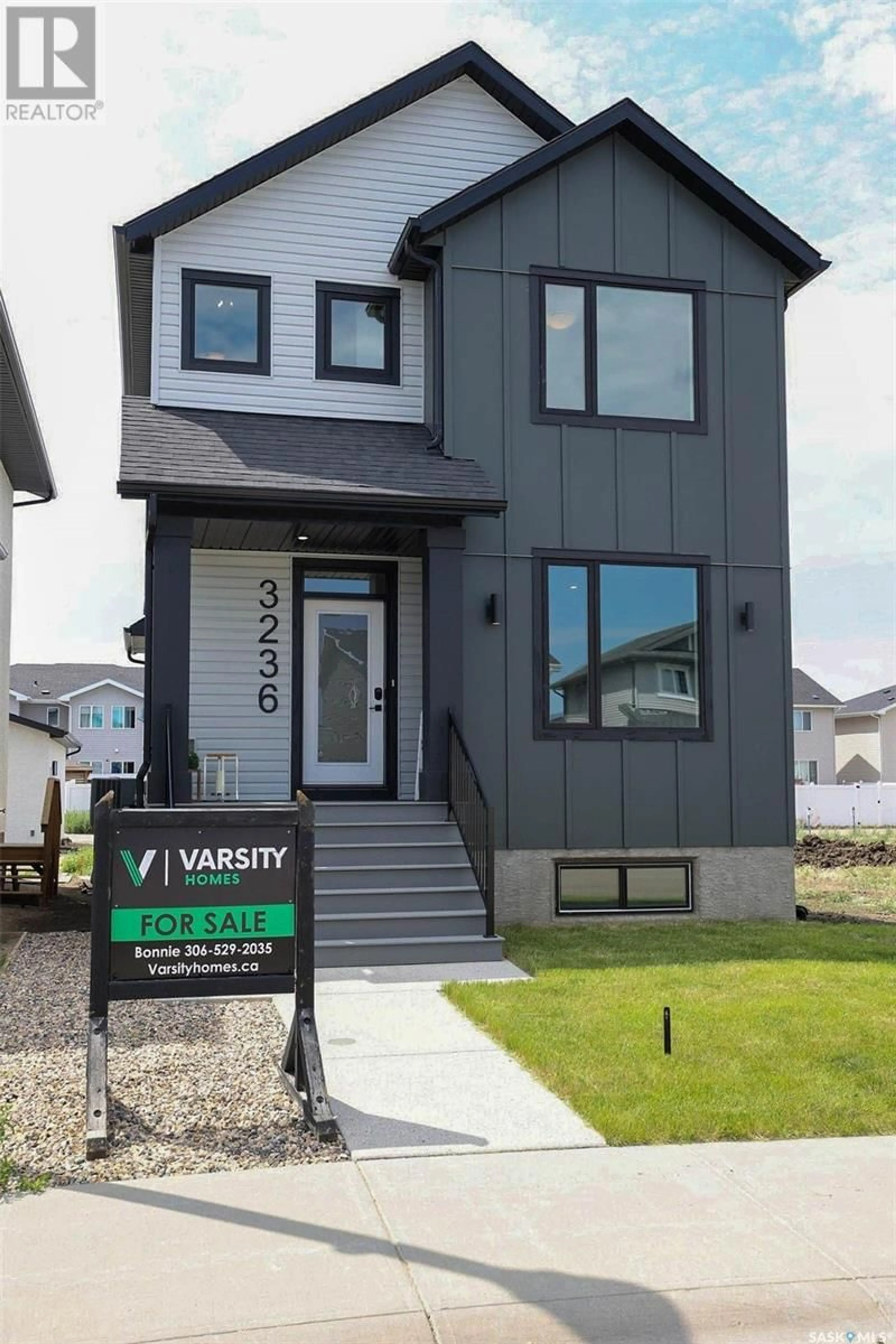 Home with vinyl exterior material, street for 3236 GREEN WATER DRIVE, Regina Saskatchewan S4V3R5