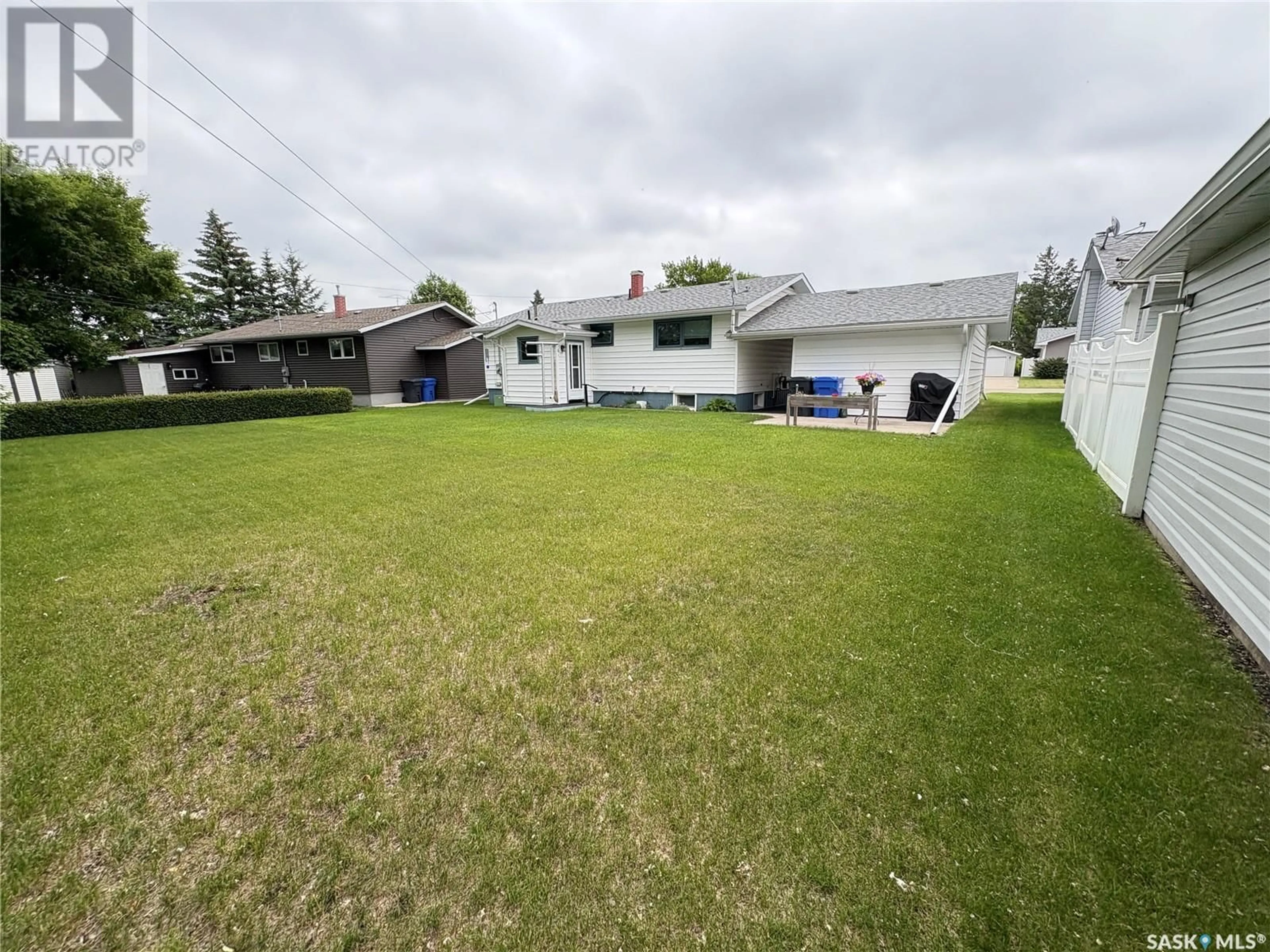 A pic from outside/outdoor area/front of a property/back of a property/a pic from drone, unknown for 204 HILLSIDE BAY, Langenburg Saskatchewan S0A2A0