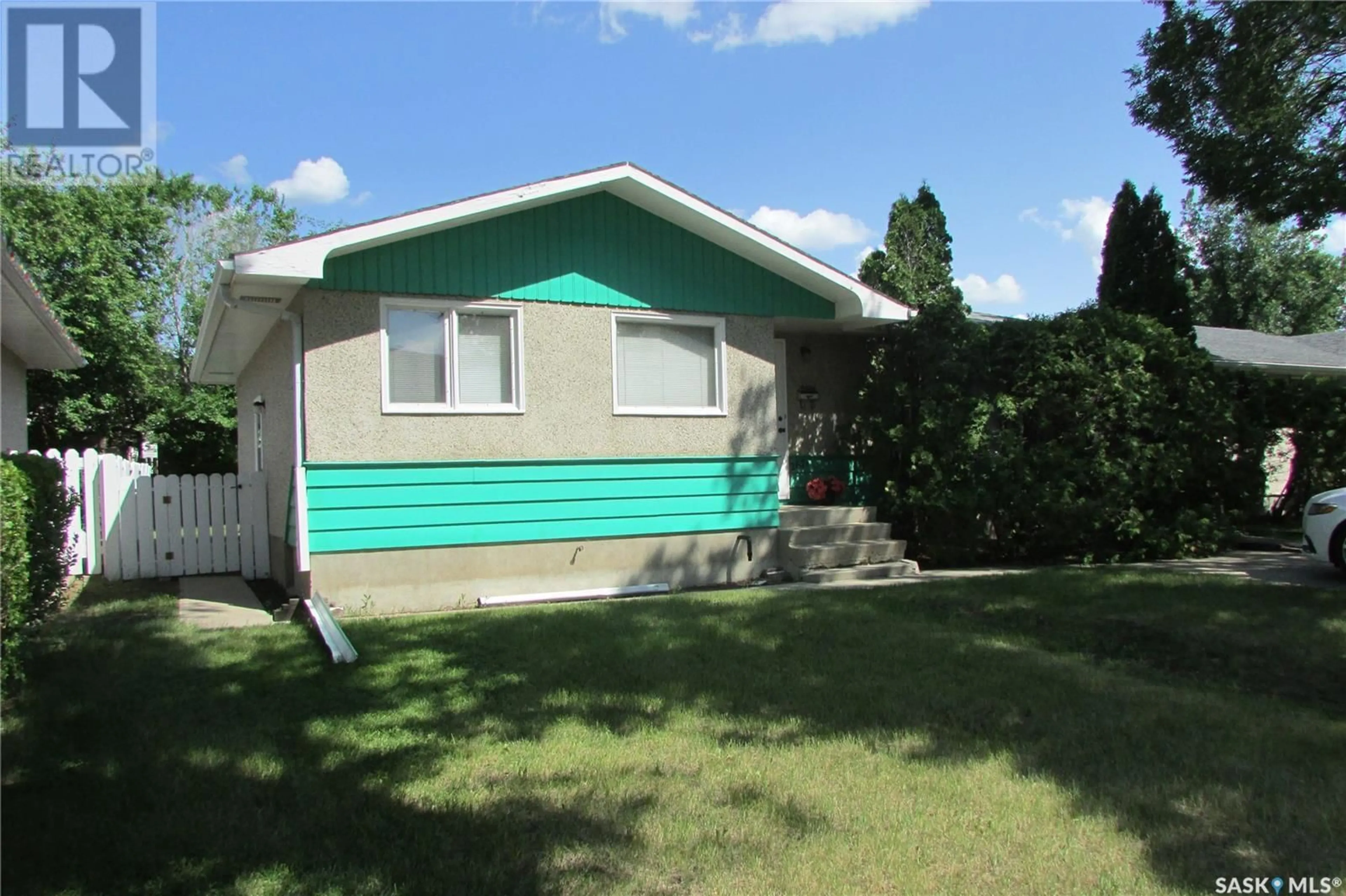 Home with vinyl exterior material, street for 267 SMITH STREET, Regina Saskatchewan S4R3B5