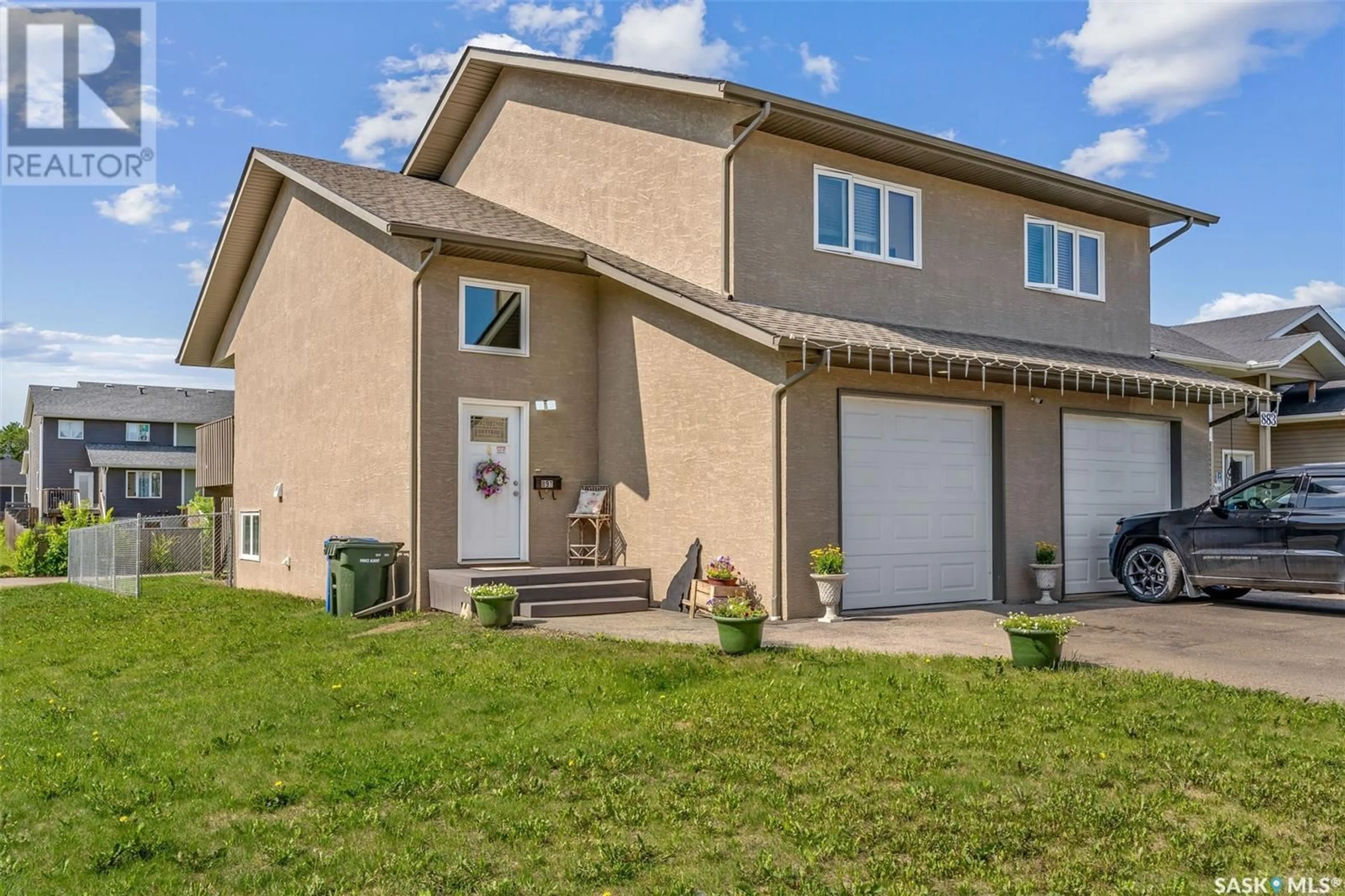 Home with vinyl exterior material, street for 897 5TH STREET, Prince Albert Saskatchewan S6V2L6