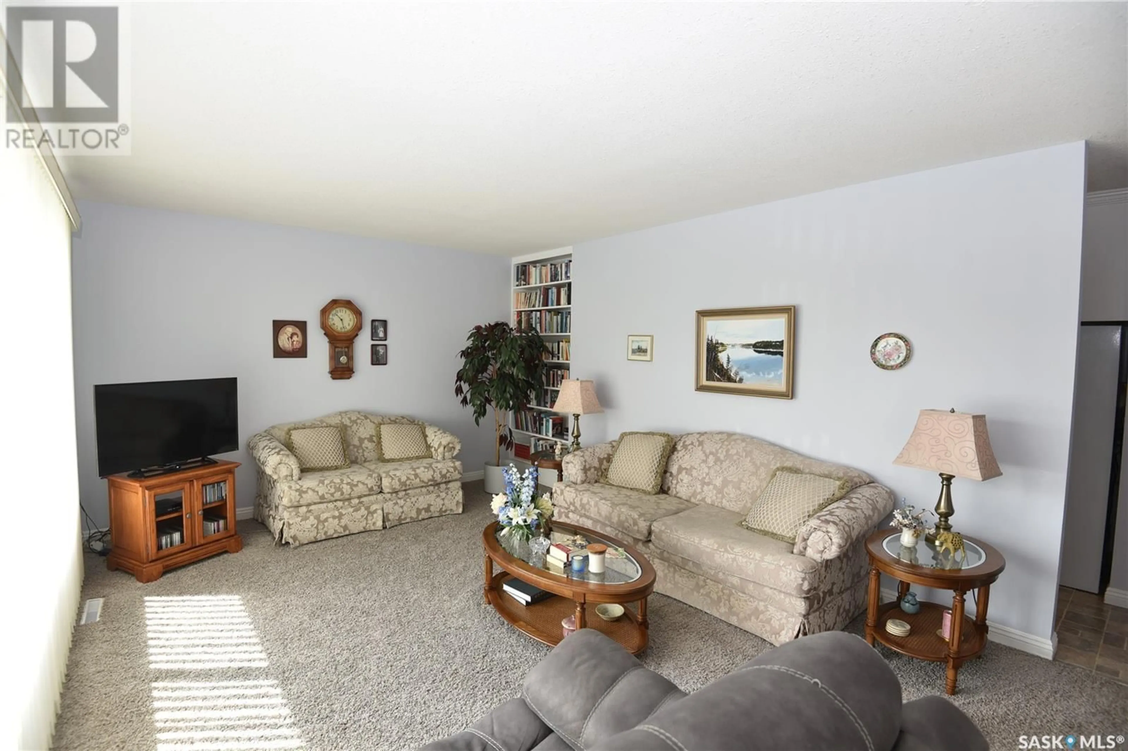 Living room with furniture, unknown for 802 2ND STREET E, Nipawin Saskatchewan S0E1E0
