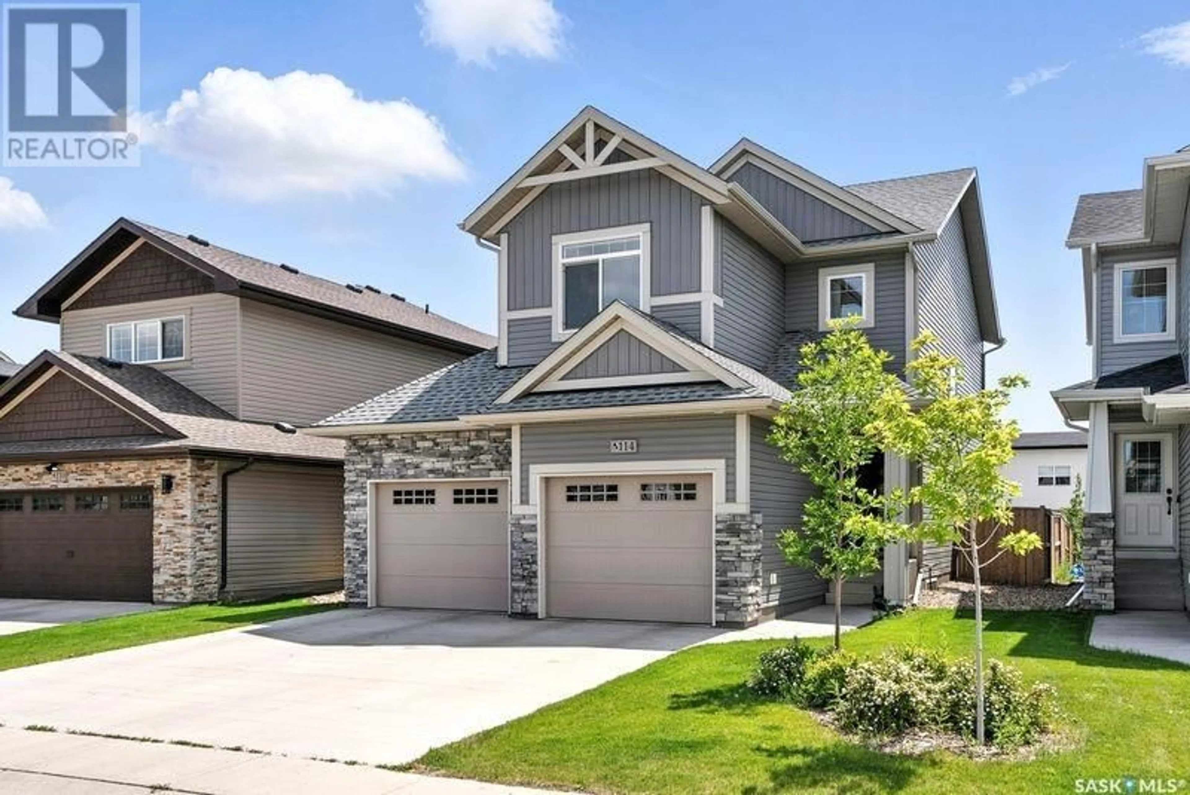 Home with vinyl exterior material, street for 114 GERMAIN COURT, Saskatoon Saskatchewan S7W0Y3