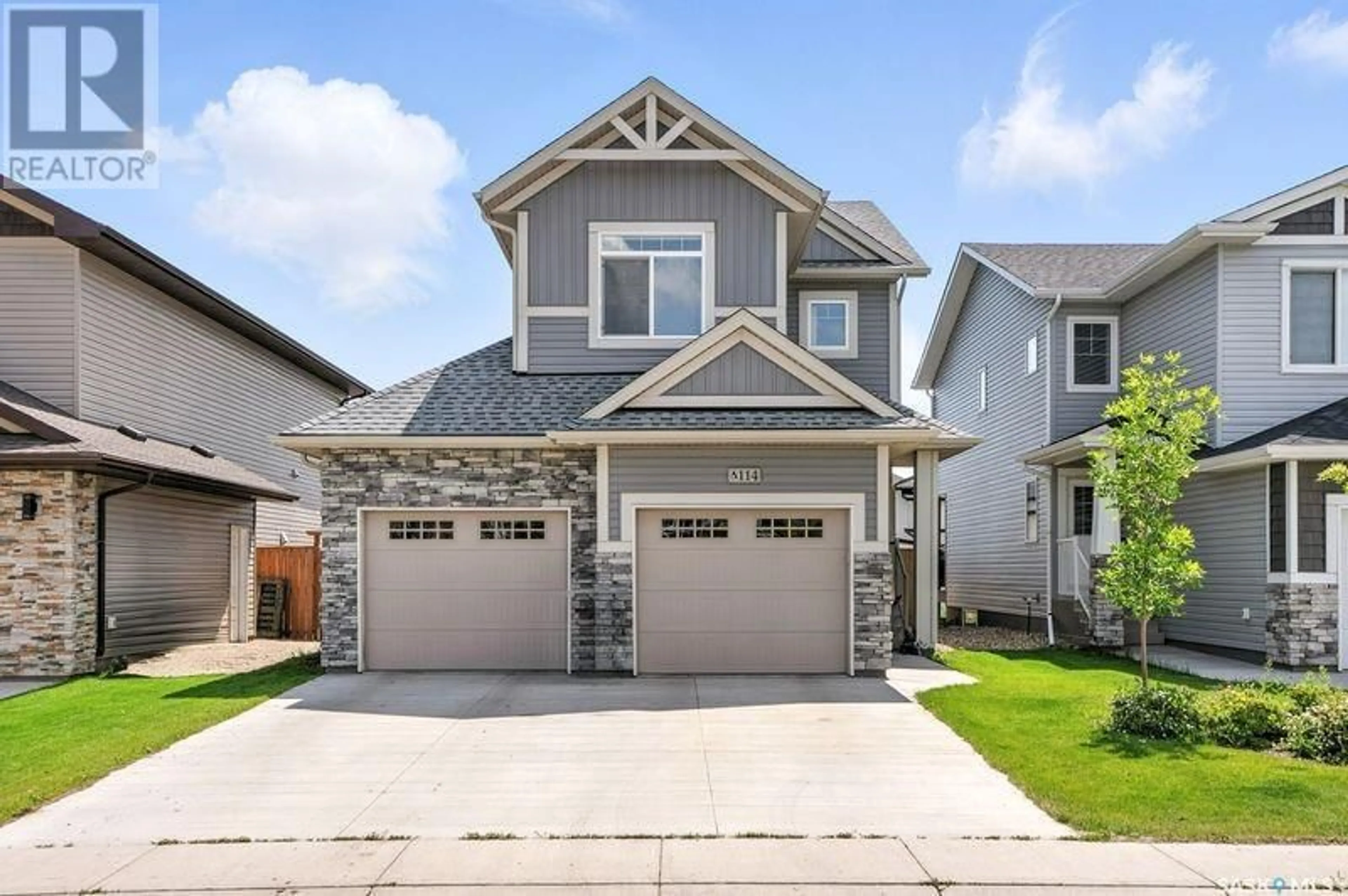 Home with vinyl exterior material, street for 114 GERMAIN COURT, Saskatoon Saskatchewan S7W0Y3