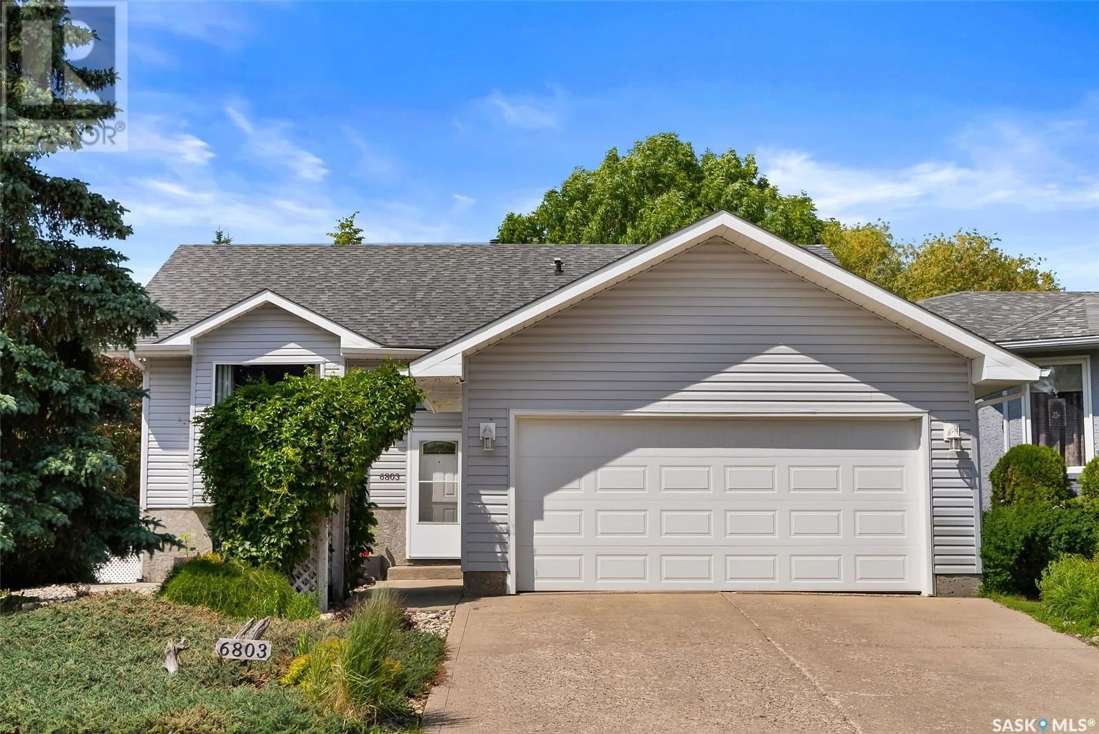 Home with vinyl exterior material, street for 6803 MAPLE WOOD CRESCENT, Regina Saskatchewan S4X4J8