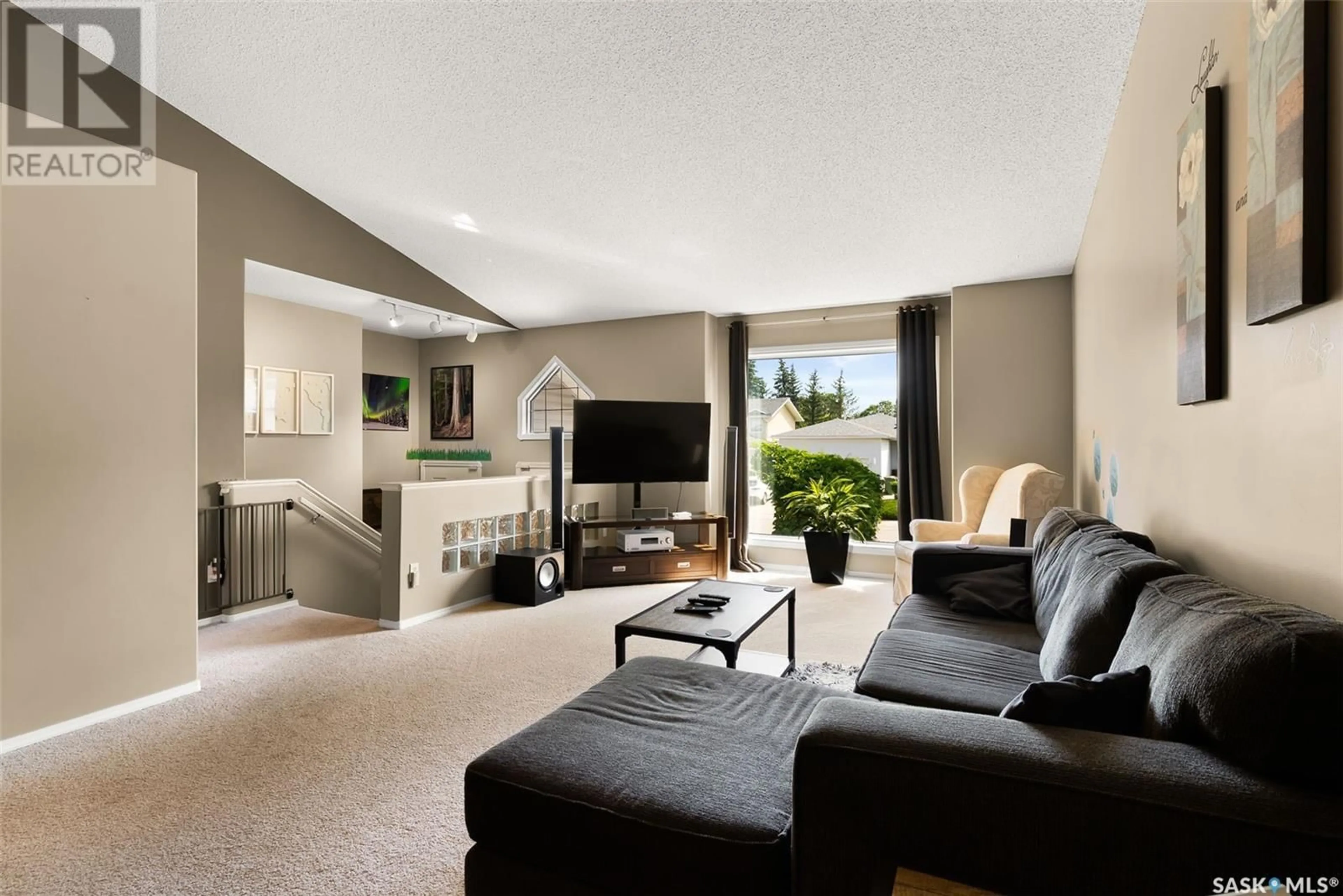 Living room with furniture, unknown for 6803 MAPLE WOOD CRESCENT, Regina Saskatchewan S4X4J8