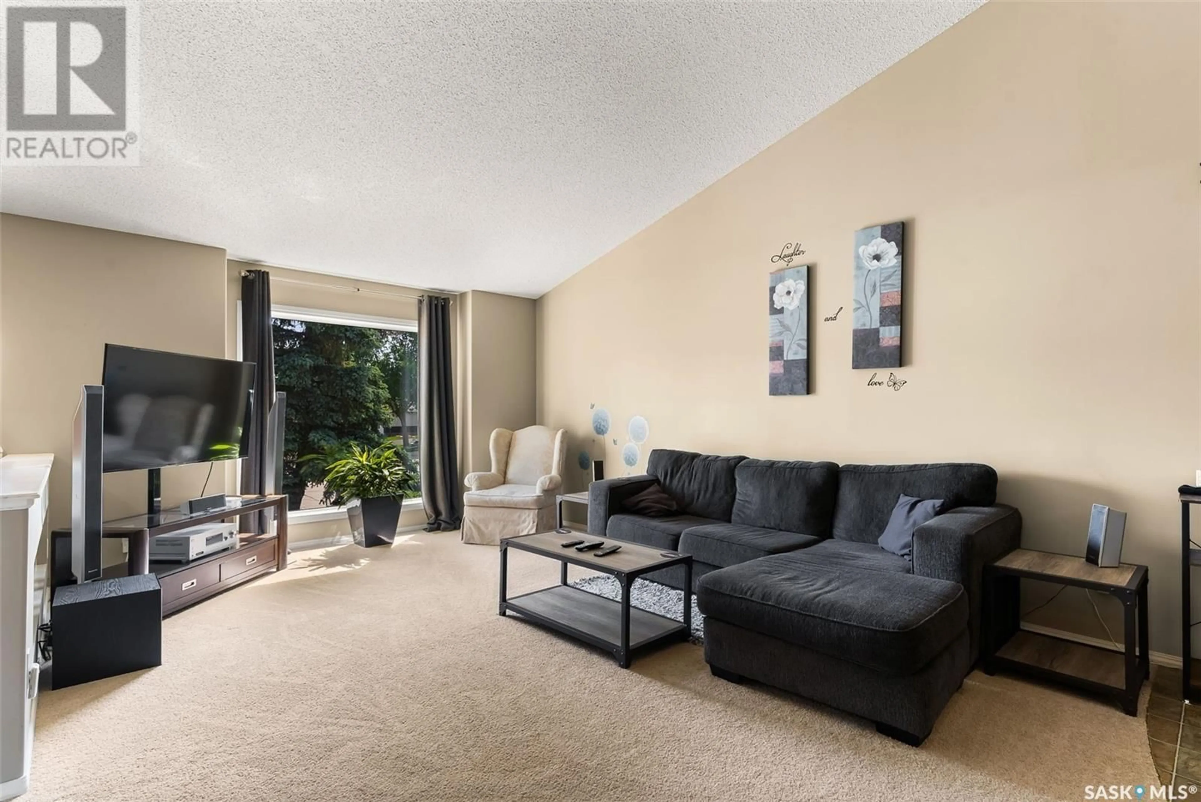 Living room with furniture, unknown for 6803 MAPLE WOOD CRESCENT, Regina Saskatchewan S4X4J8