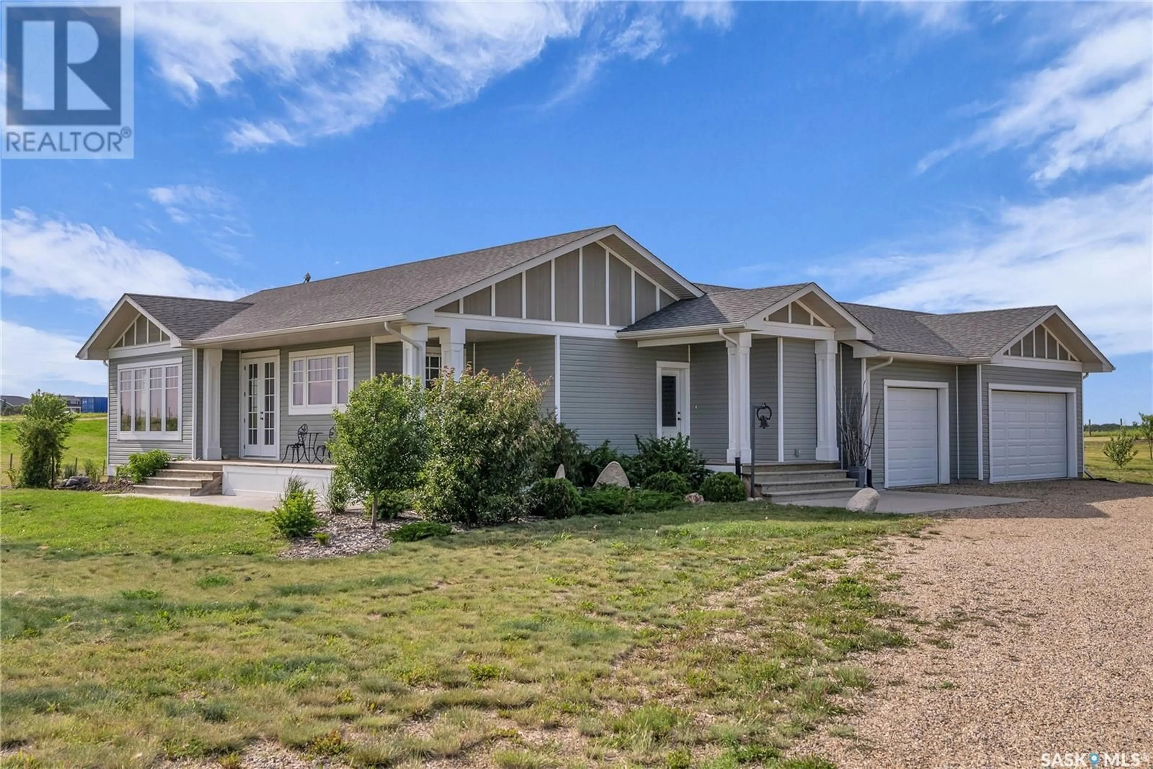 Home with vinyl exterior material, street for 11 COUNTRY HILLS ESTATES, Blucher Rm No. 343 Saskatchewan S0K0Y0