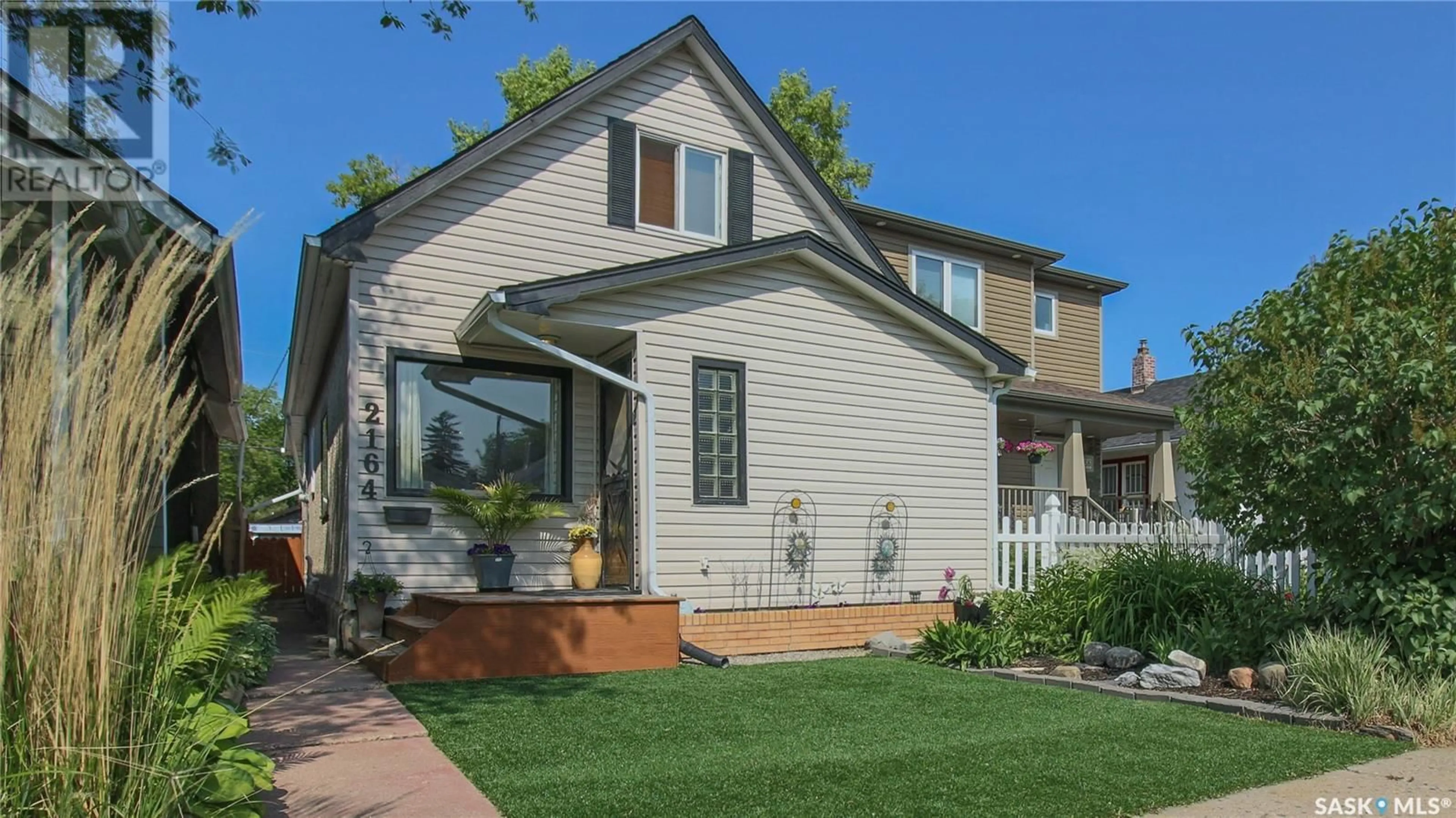 Home with vinyl exterior material, street for 2164 ATKINSON STREET, Regina Saskatchewan S4N3W9