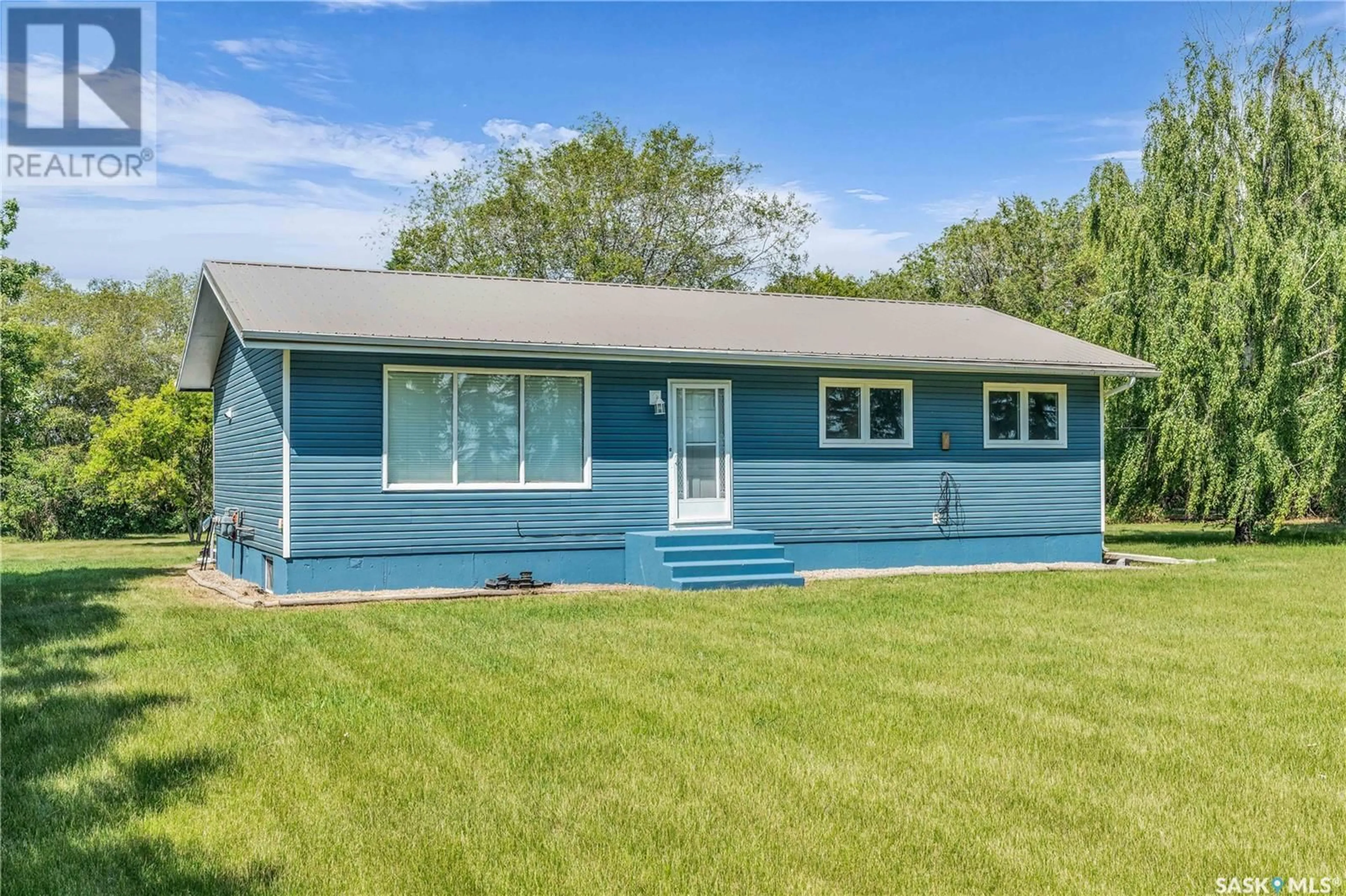 Home with vinyl exterior material, street for RM OF NORTH BATTLEFORD ACREAGE, North Battleford Rm No. 437 Saskatchewan S9A2Y7