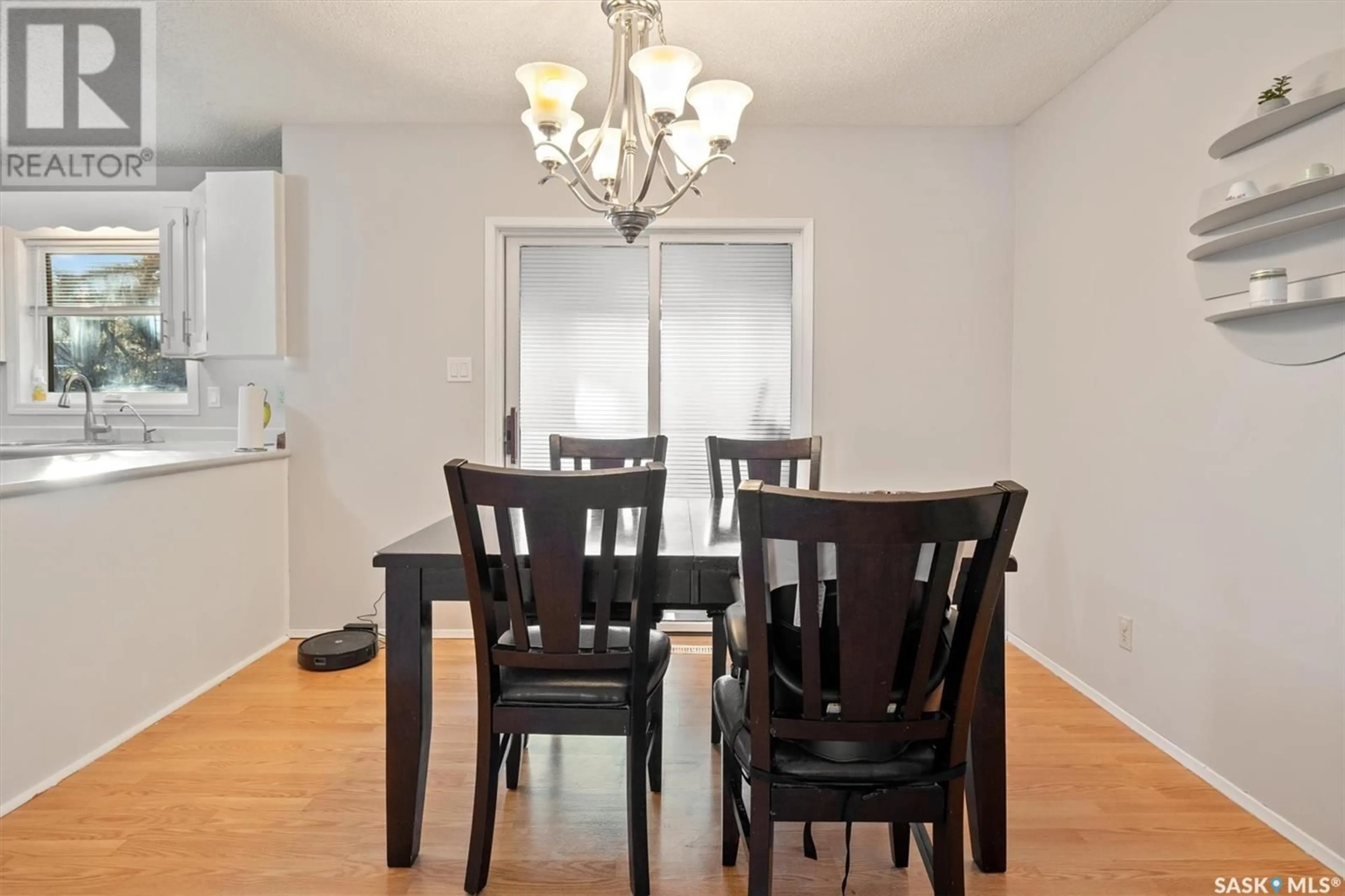 Dining room, wood/laminate floor for 126 KELLINS CRESCENT, Saskatoon Saskatchewan S7N2X6