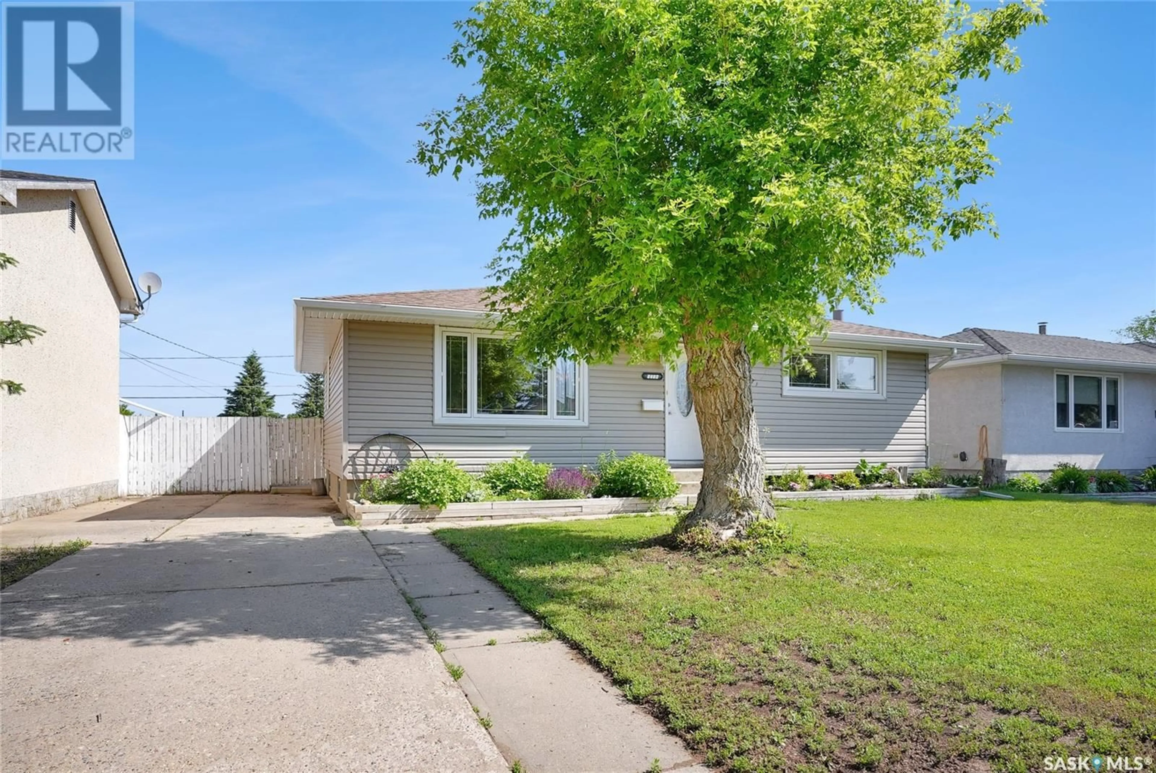 Home with vinyl exterior material, street for 1314 VAUGHAN STREET, Moose Jaw Saskatchewan S6H5P7