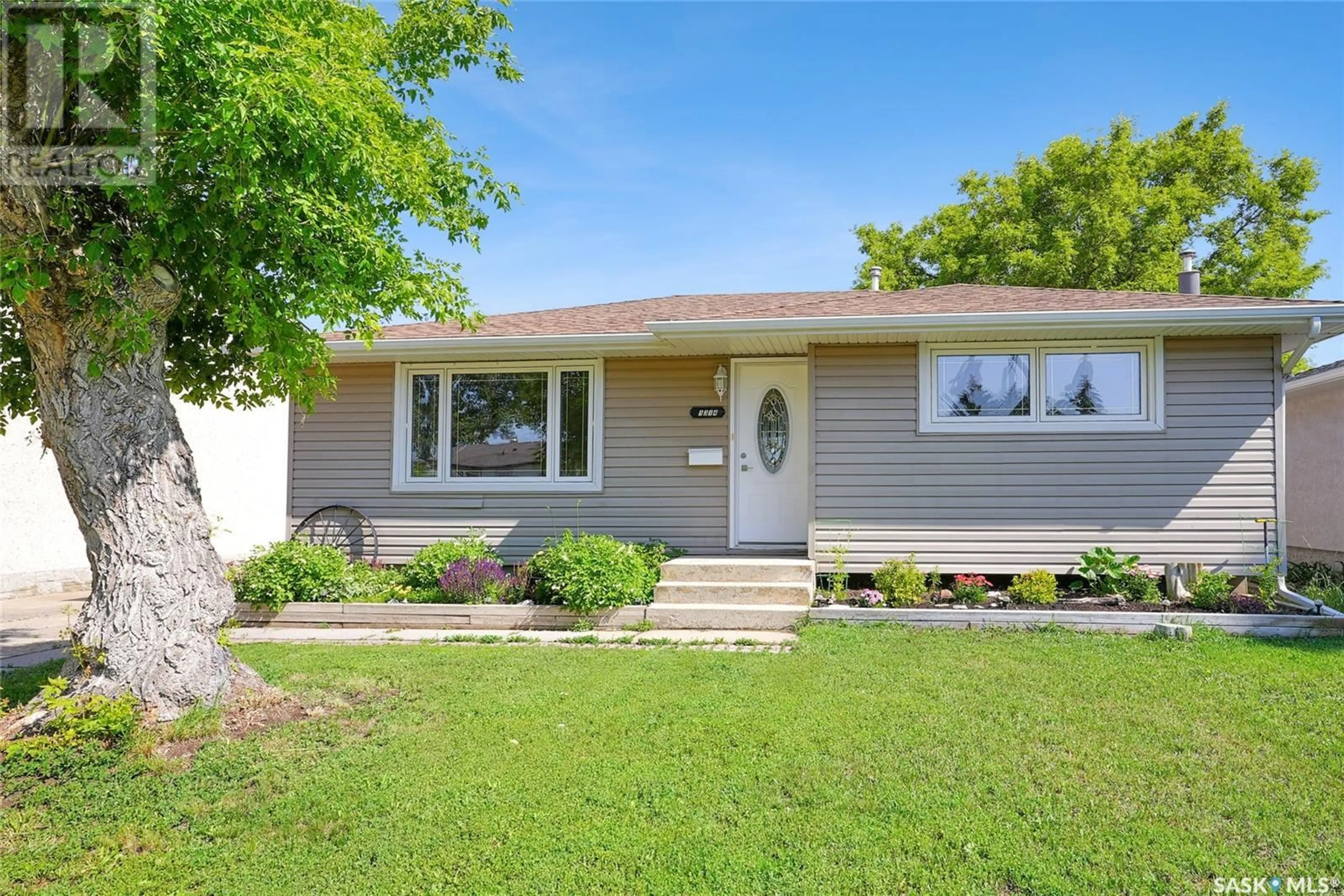Home with vinyl exterior material, street for 1314 VAUGHAN STREET, Moose Jaw Saskatchewan S6H5P7