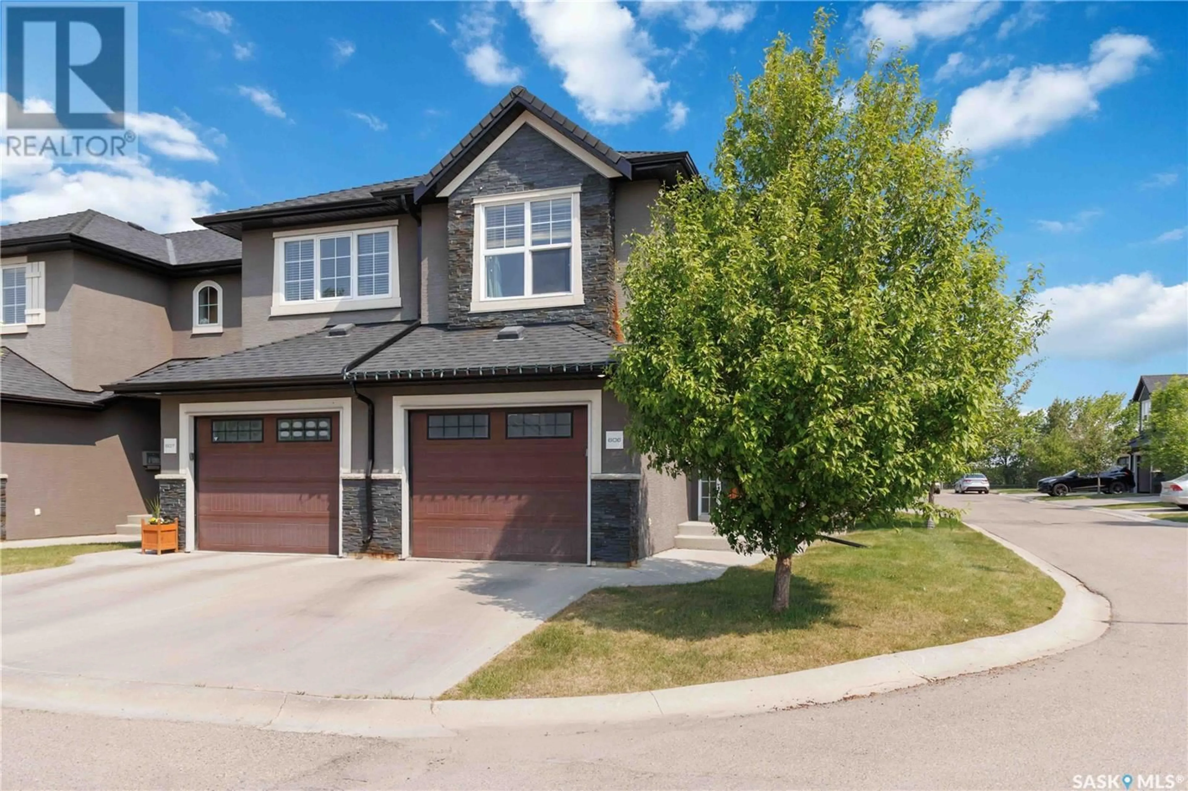 Home with brick exterior material, street for 1303 - 606 PATON CRESCENT, Saskatoon Saskatchewan S7W0P9