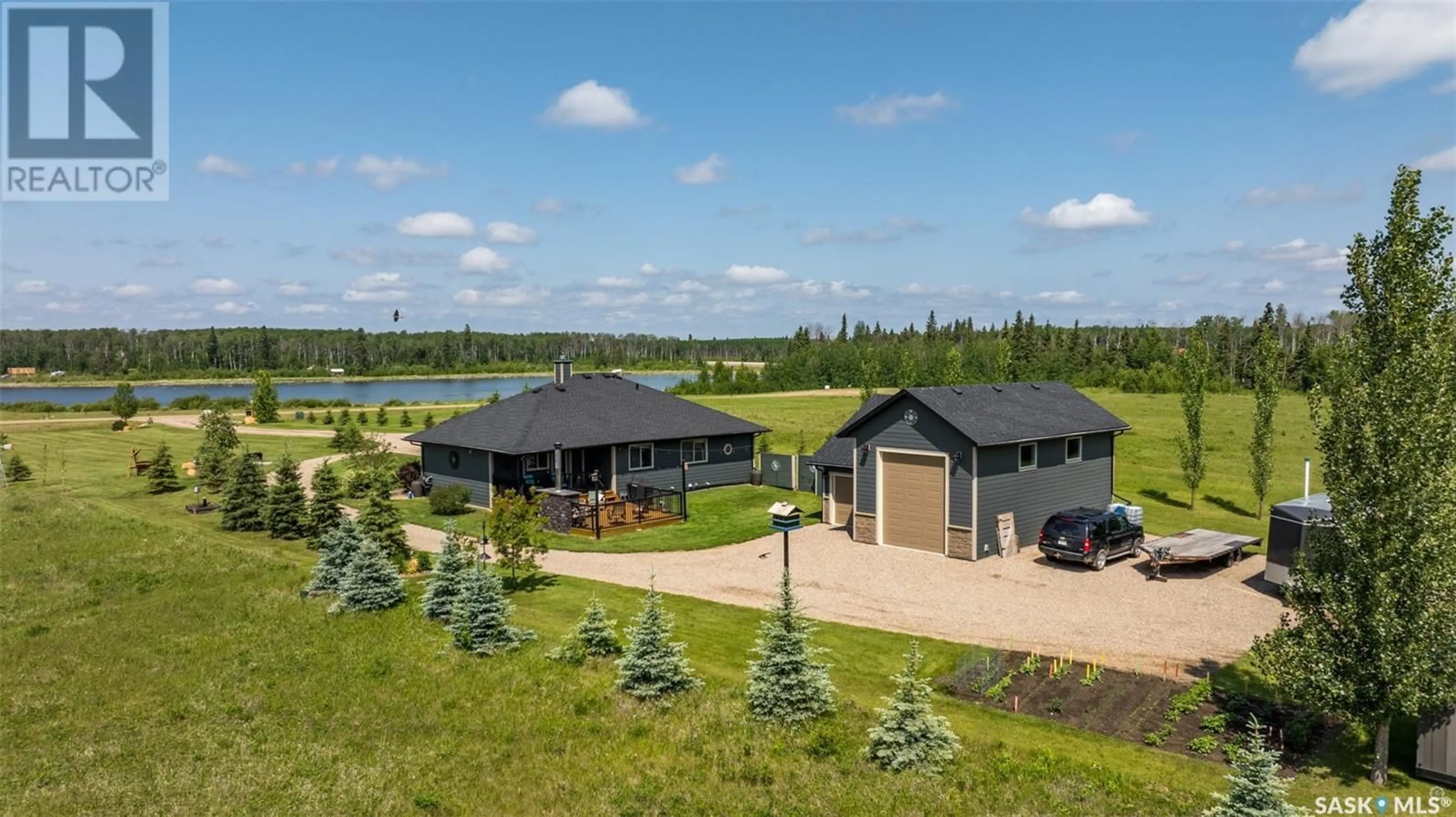 A pic from outside/outdoor area/front of a property/back of a property/a pic from drone, water/lake/river/ocean view for 205 ASPEN COVE, Paddockwood Rm No. 520 Saskatchewan S0J0N0