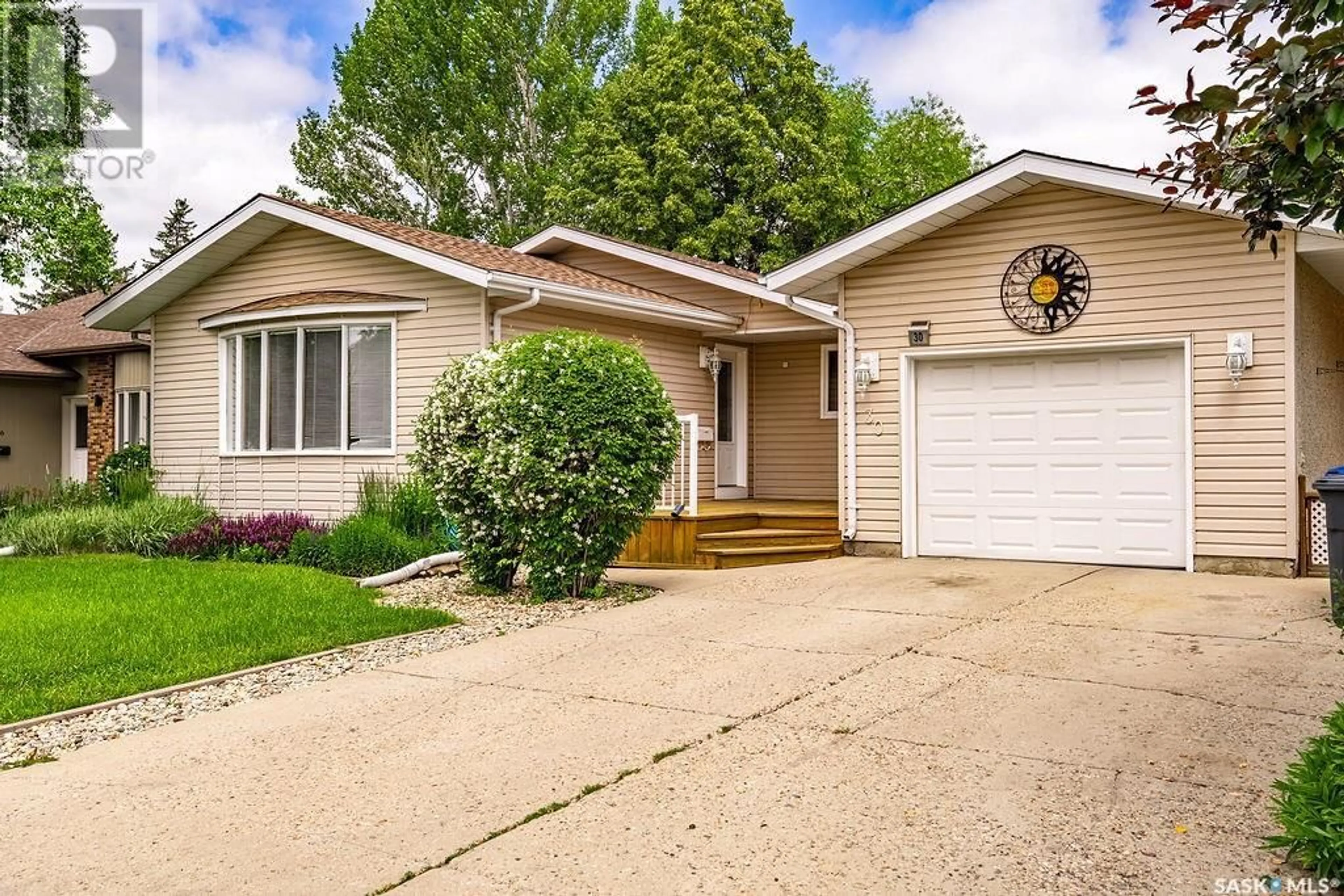 Home with vinyl exterior material, street for 30 BAIN CRESCENT, Saskatoon Saskatchewan S7K6H4