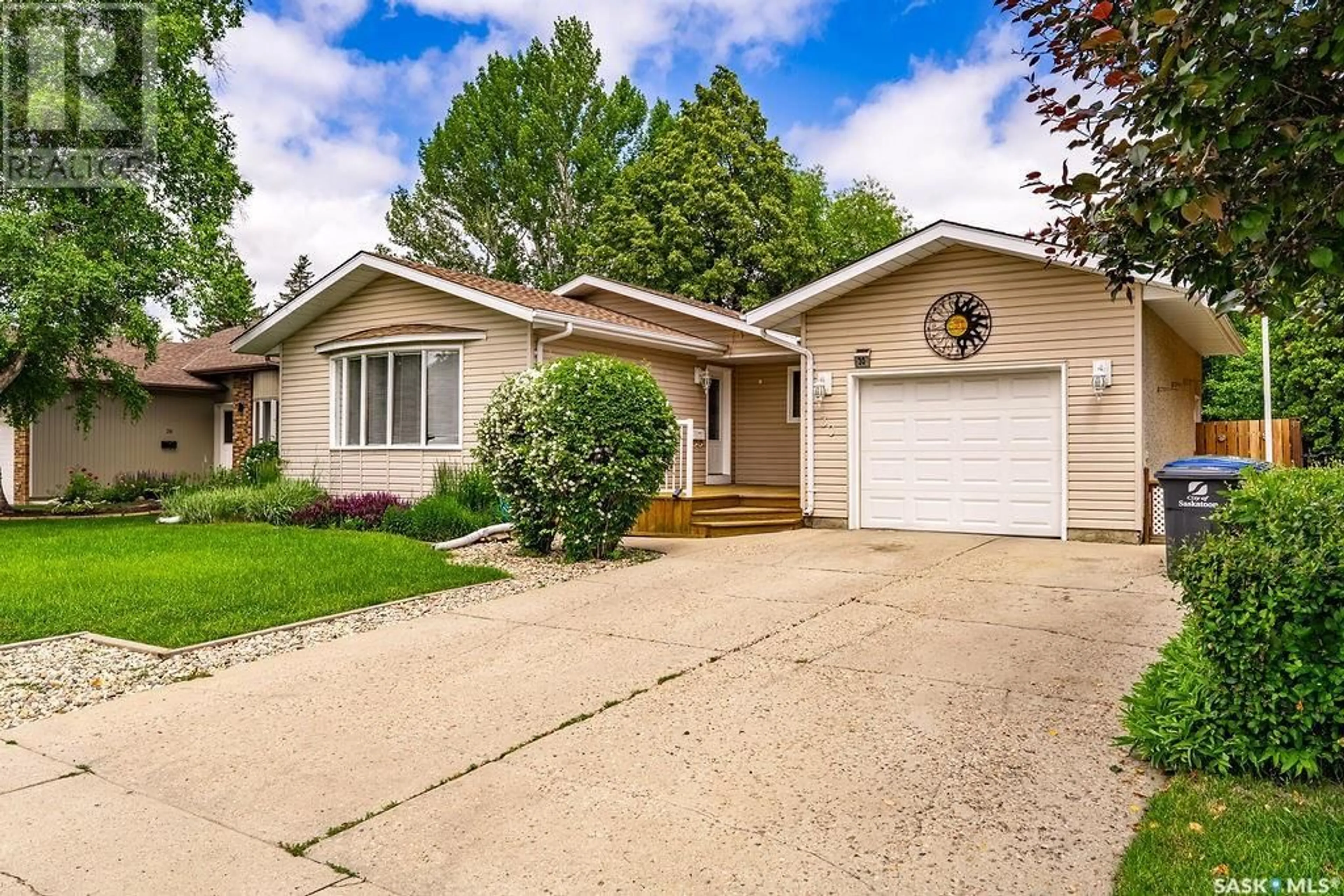 Home with vinyl exterior material, street for 30 BAIN CRESCENT, Saskatoon Saskatchewan S7K6H4