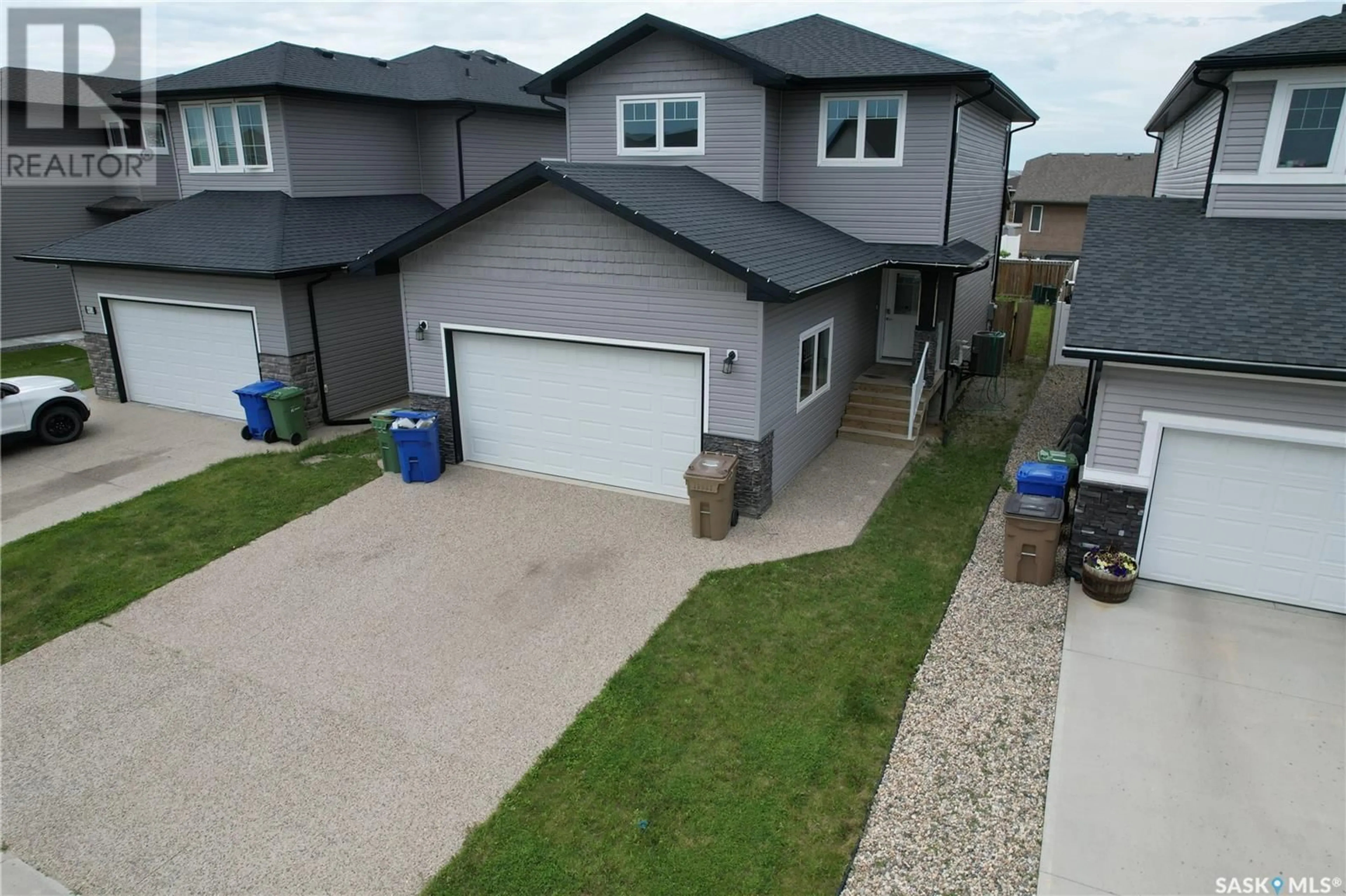 A pic from outside/outdoor area/front of a property/back of a property/a pic from drone, street for 4830 GREEN APPLE DRIVE, Regina Saskatchewan S4V3L2