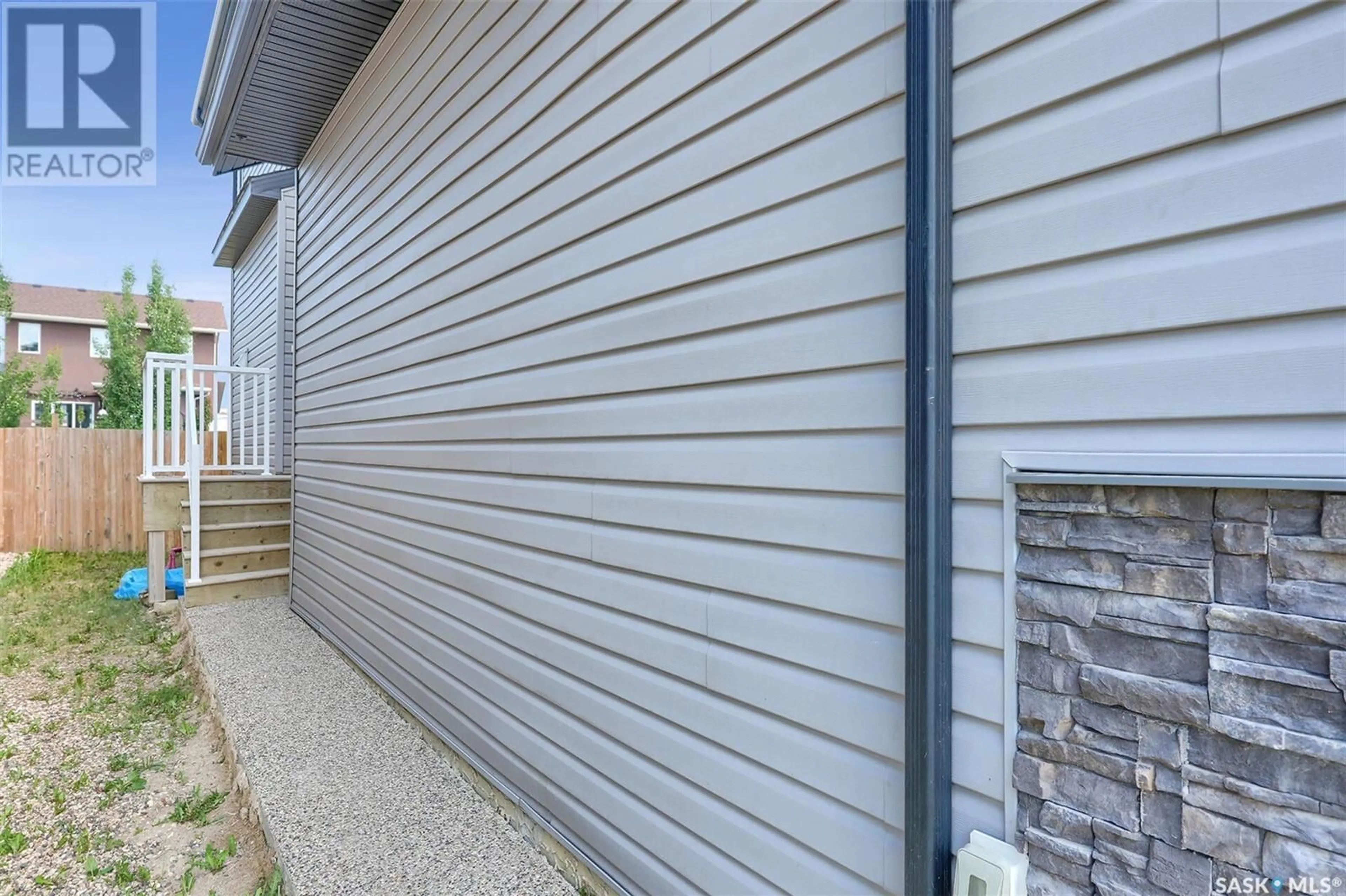 Home with vinyl exterior material, street for 4830 GREEN APPLE DRIVE, Regina Saskatchewan S4V3L2