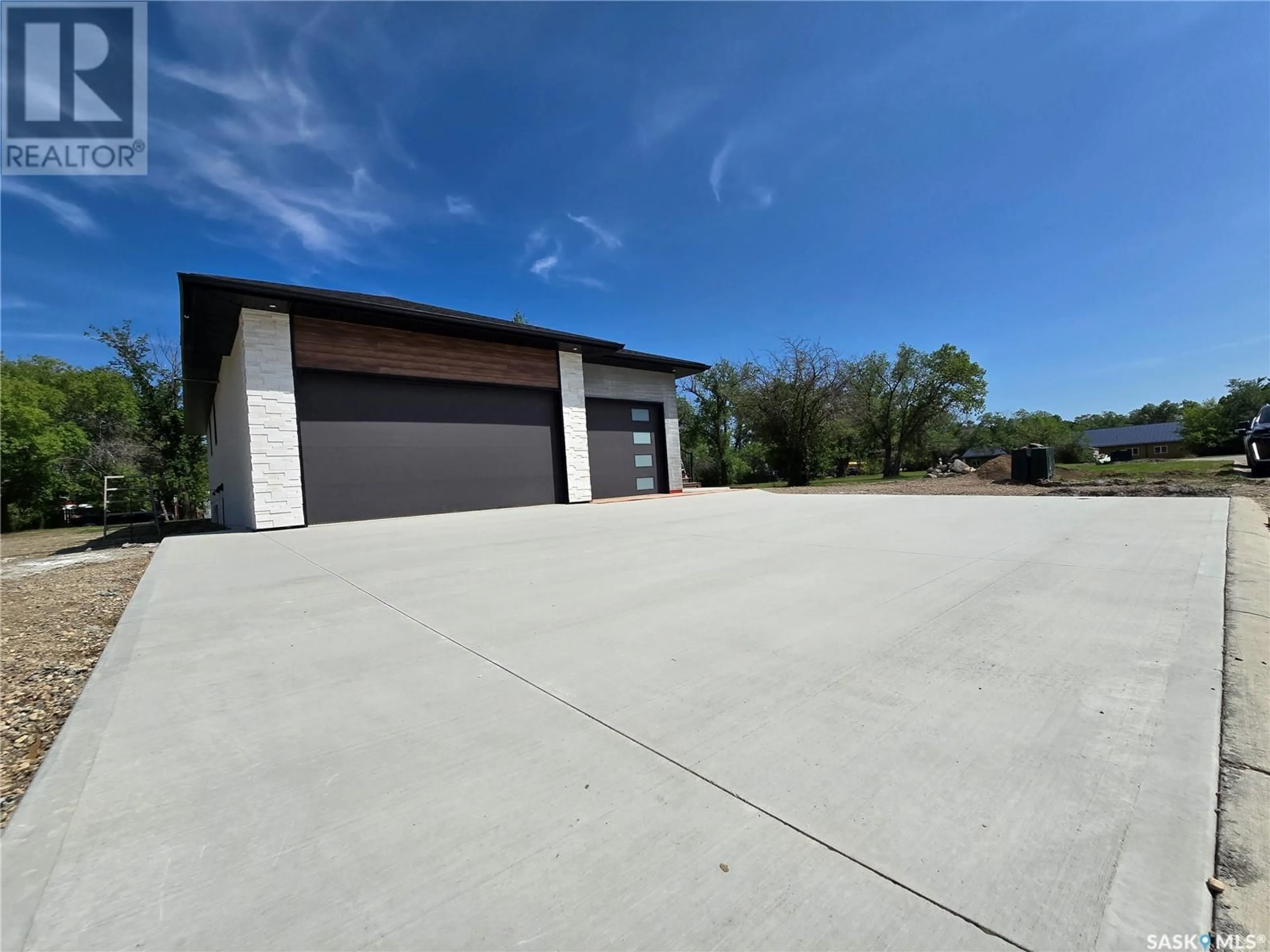 A pic from outside/outdoor area/front of a property/back of a property/a pic from drone, street for 44 KENNEY CRESCENT, Weyburn Saskatchewan S4H1L3
