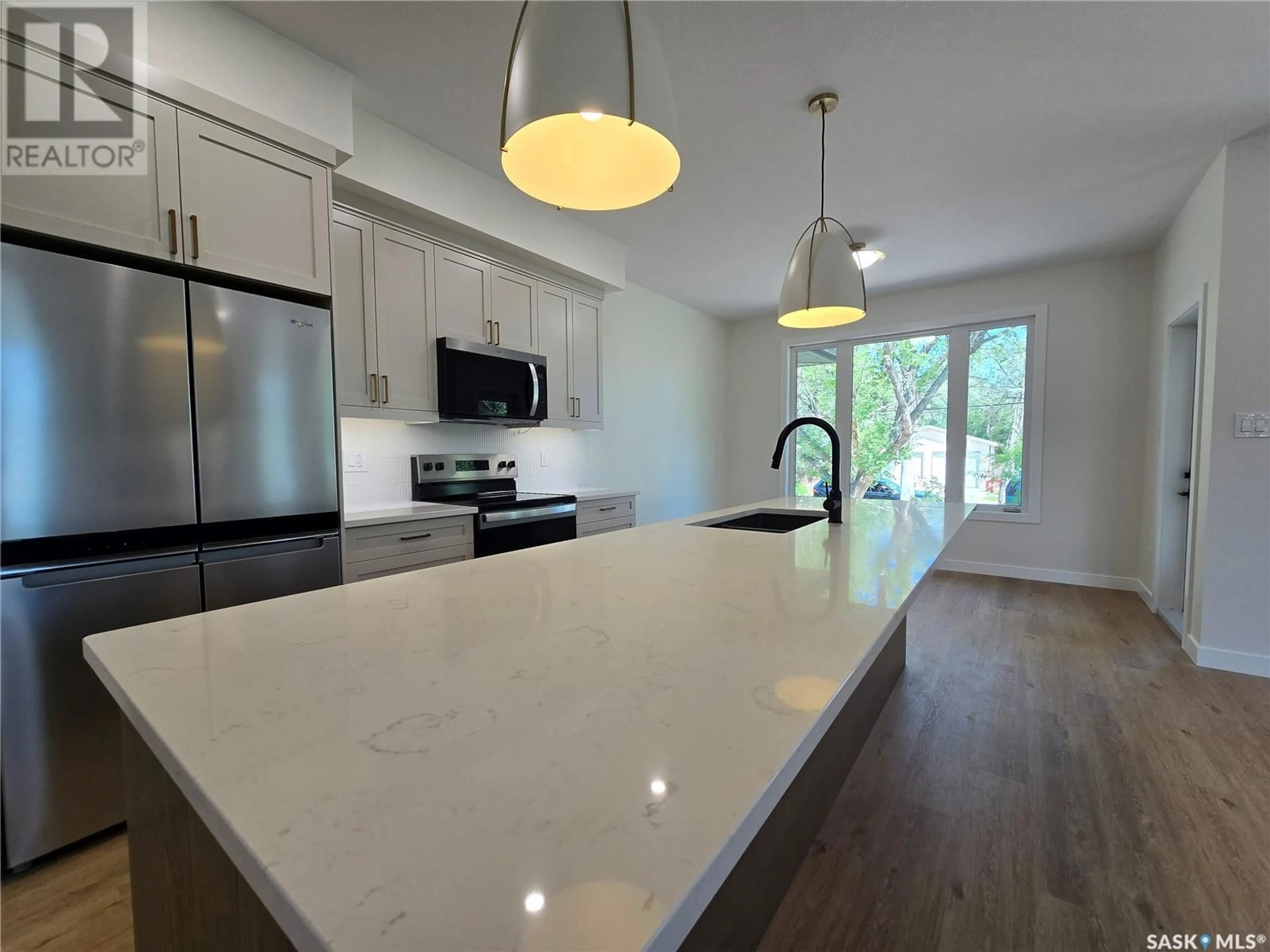 Open concept kitchen, unknown for 44 KENNEY CRESCENT, Weyburn Saskatchewan S4H1L3