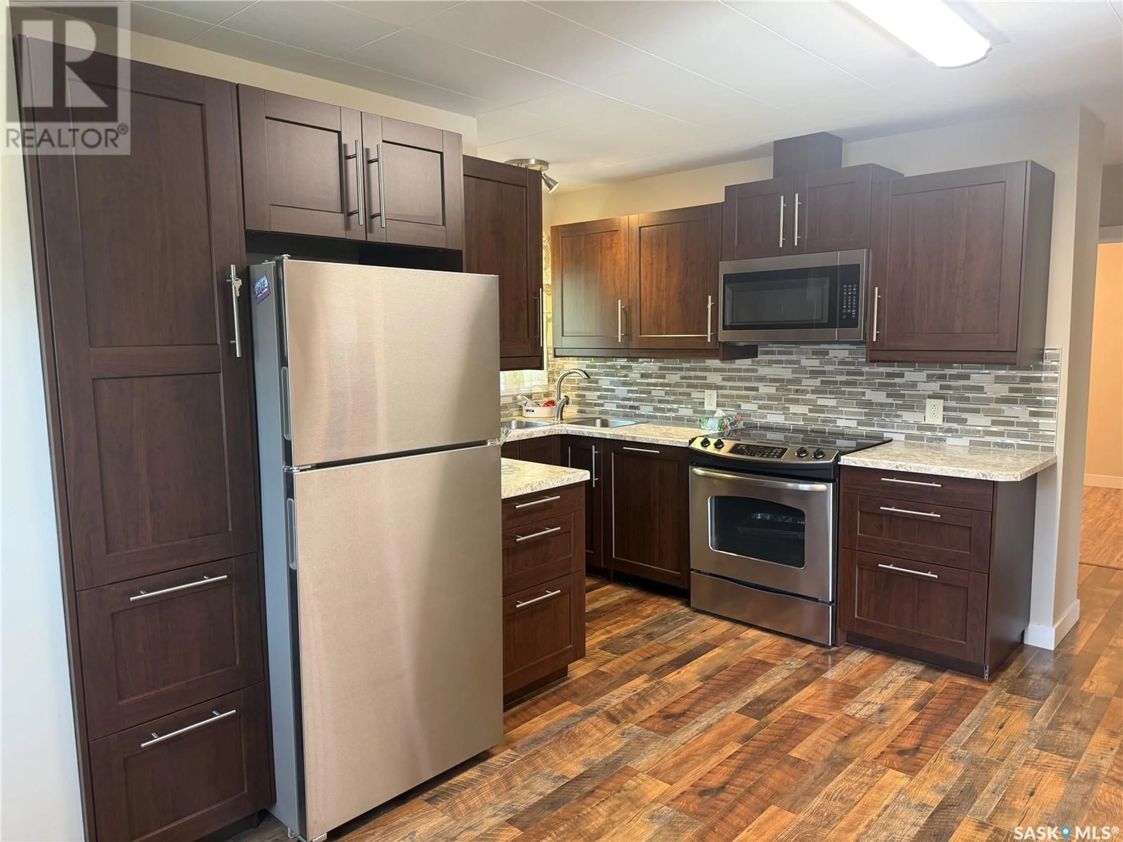 Standard kitchen, wood/laminate floor for 220 THOMSON STREET, Outlook Saskatchewan S0L2N0