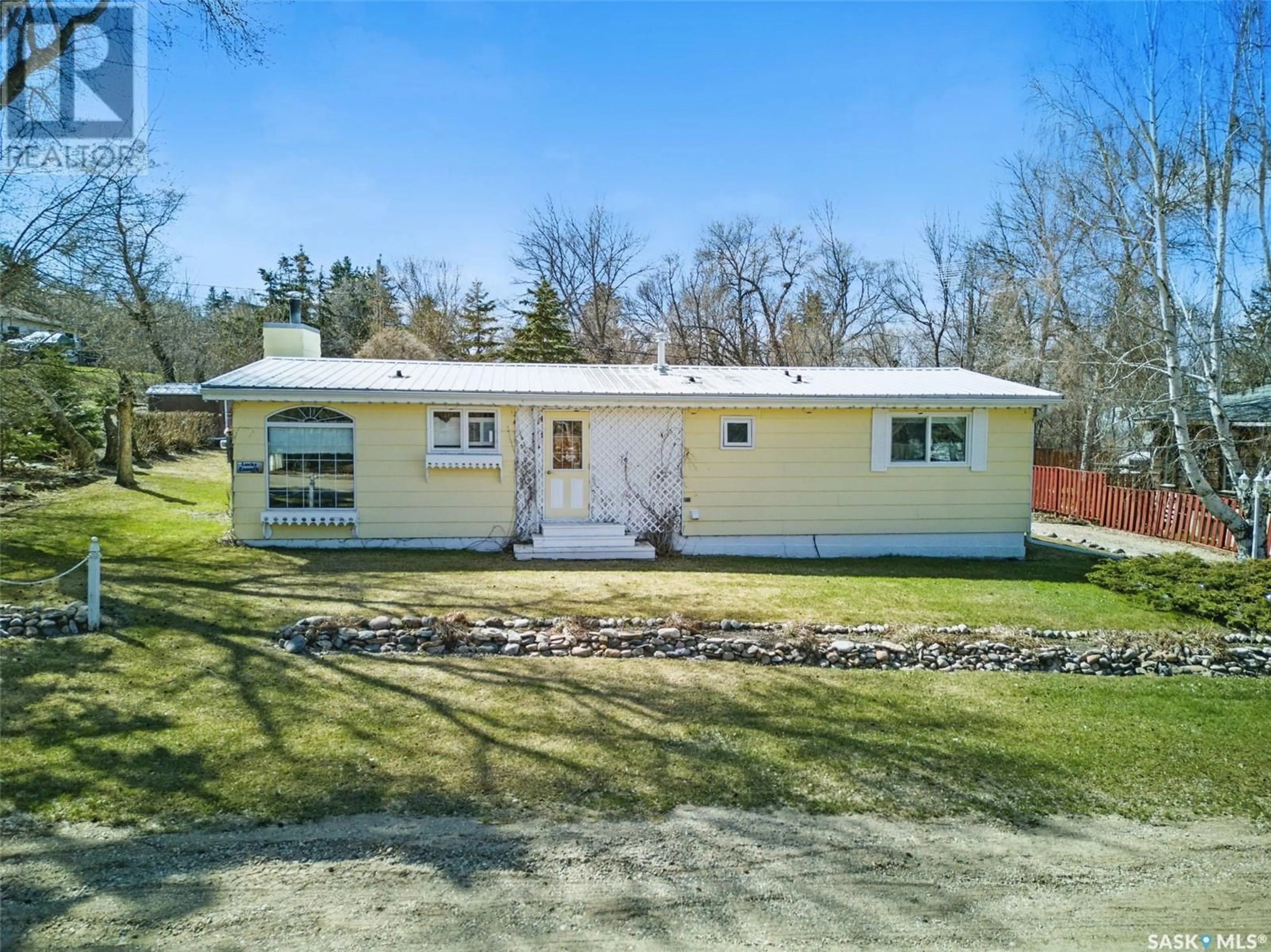 A pic from outside/outdoor area/front of a property/back of a property/a pic from drone, unknown for 108 RICHARD STREET, Manitou Beach Saskatchewan S0K4T1