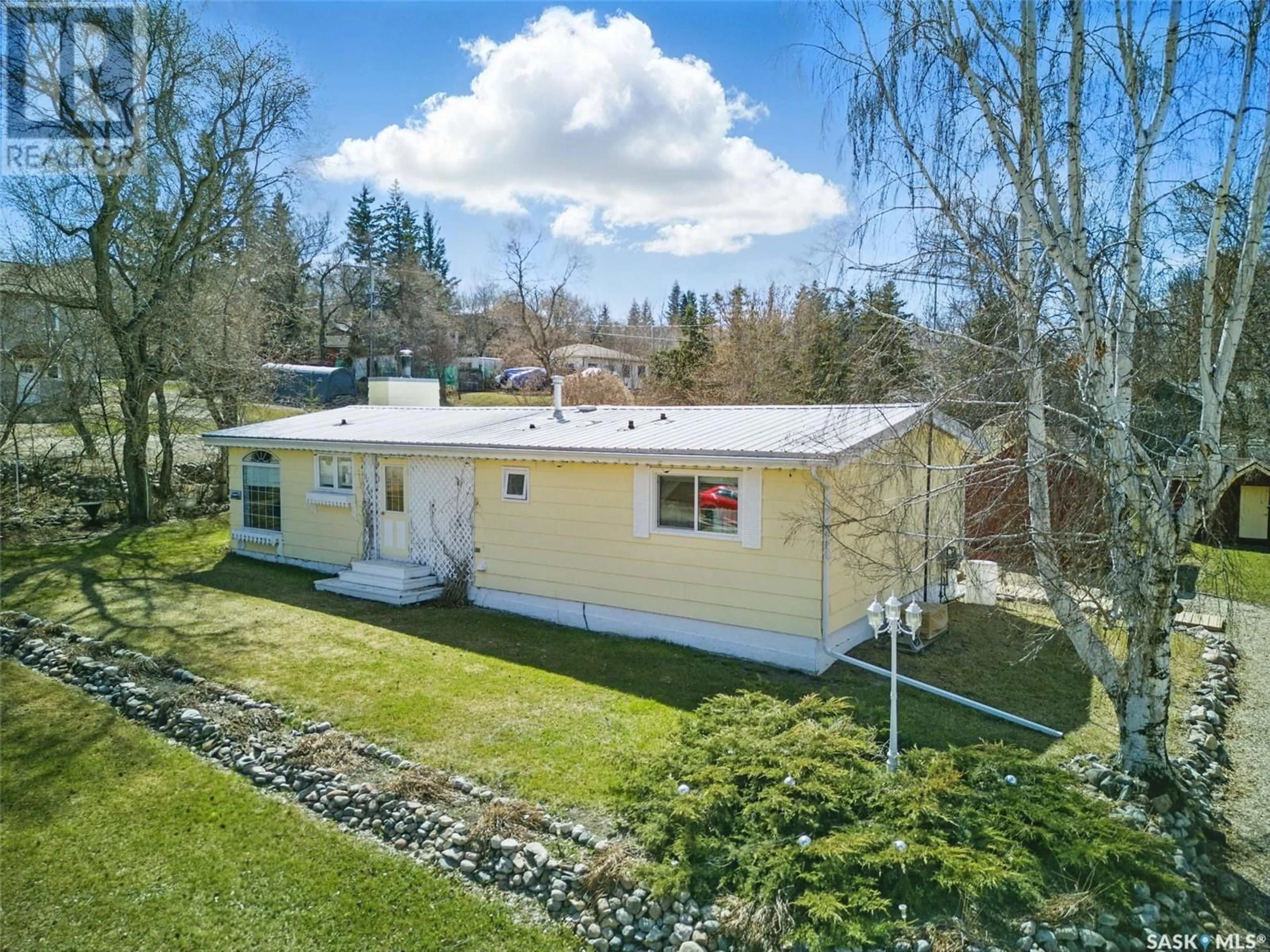 A pic from outside/outdoor area/front of a property/back of a property/a pic from drone, street for 108 RICHARD STREET, Manitou Beach Saskatchewan S0K4T1