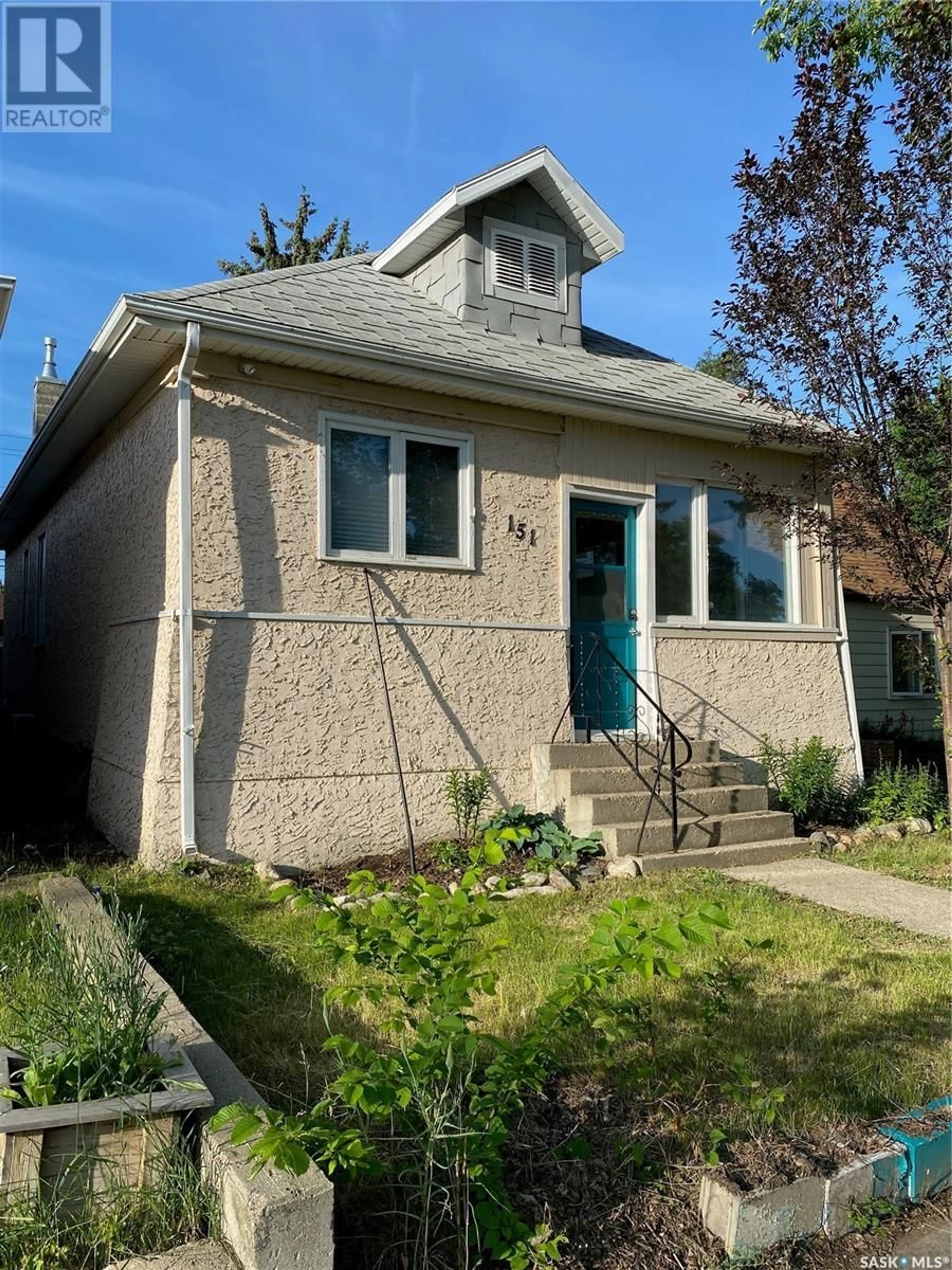 Home with vinyl exterior material, street for 151 COTEAU STREET, Moose Jaw Saskatchewan S6H5C4