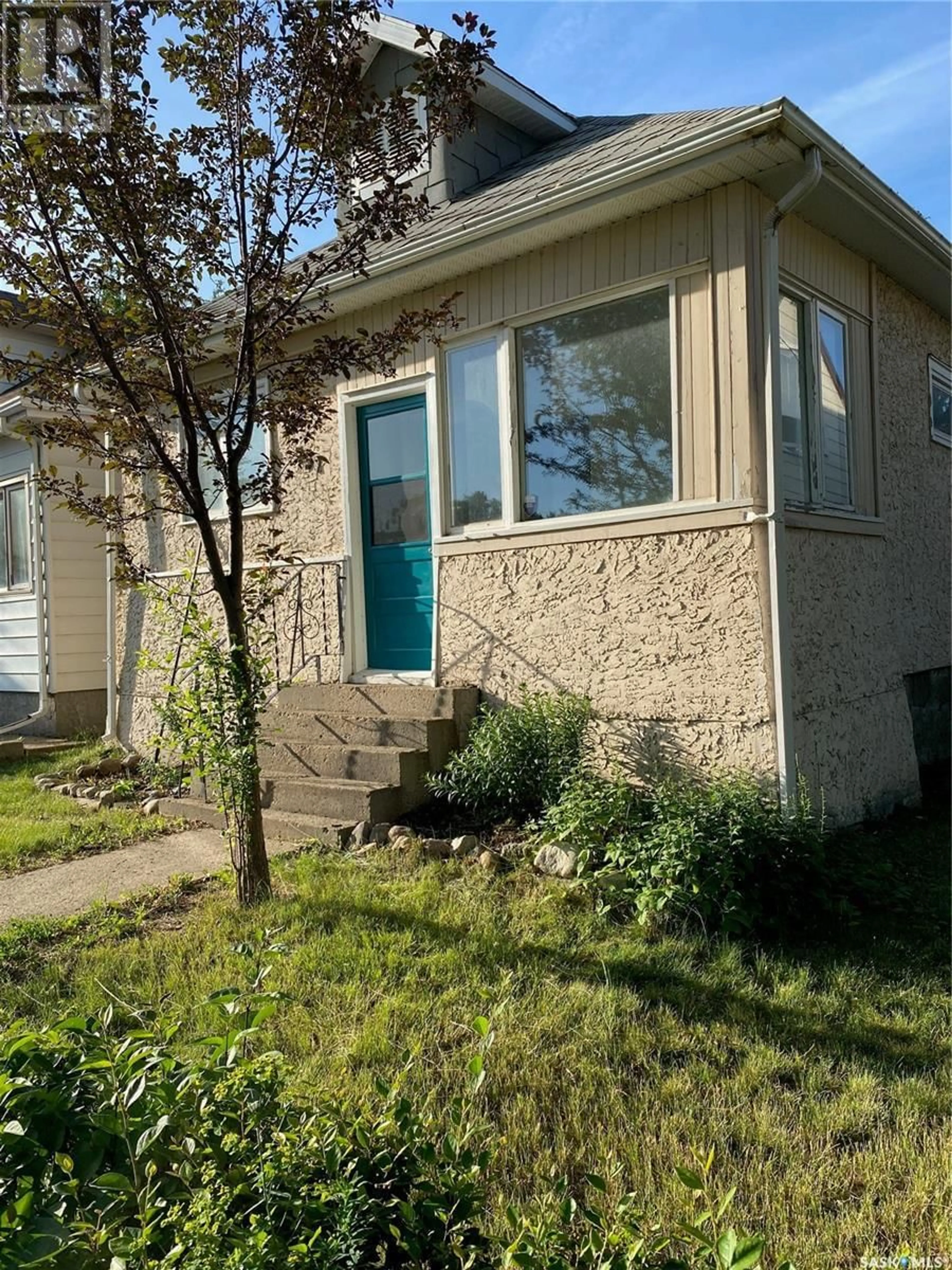 Home with vinyl exterior material, street for 151 COTEAU STREET, Moose Jaw Saskatchewan S6H5C4