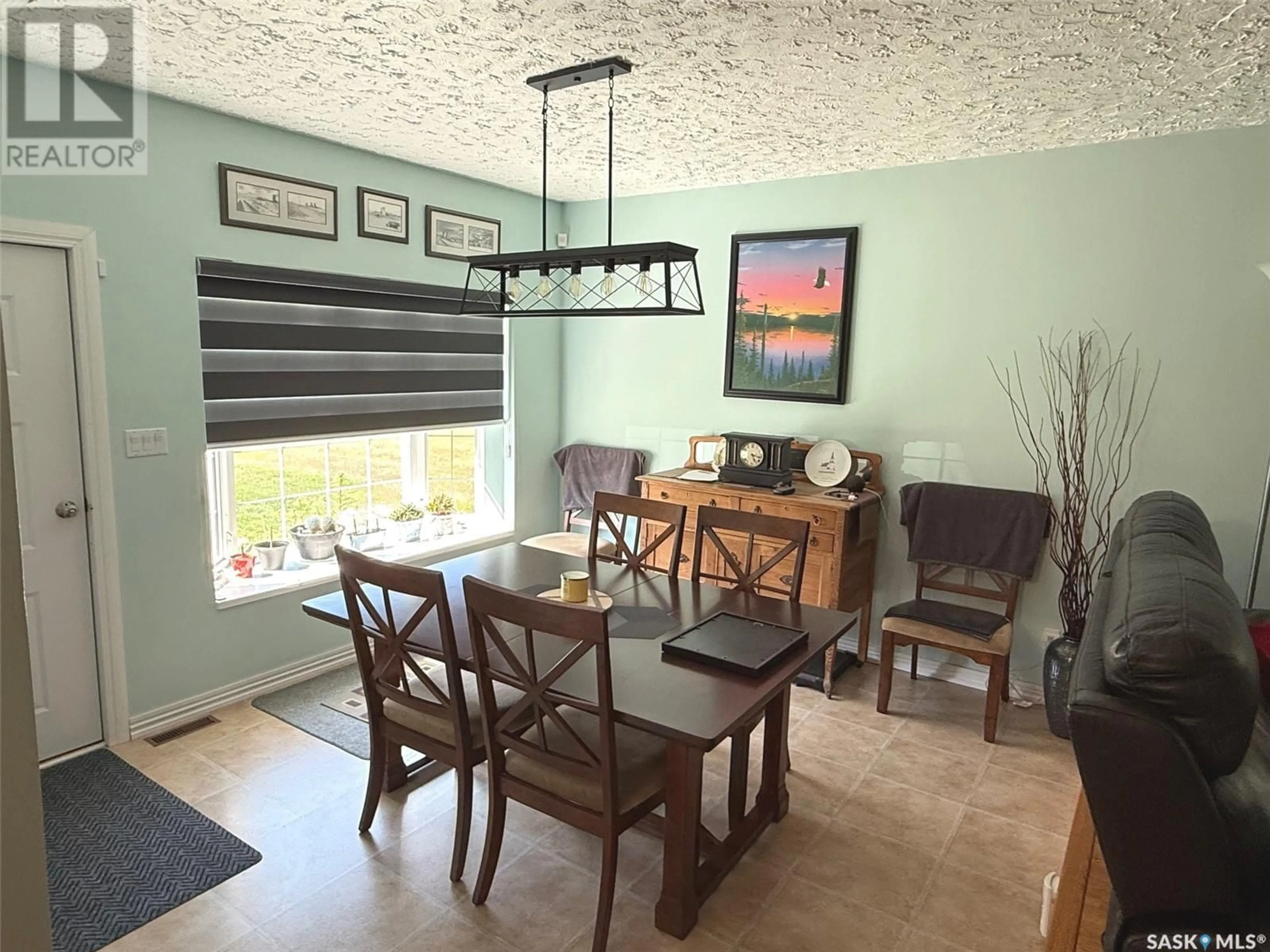 Dining room, wood/laminate floor for 25 KATEPWA AVENUE, Katepwa Beach Saskatchewan S0G2Y0