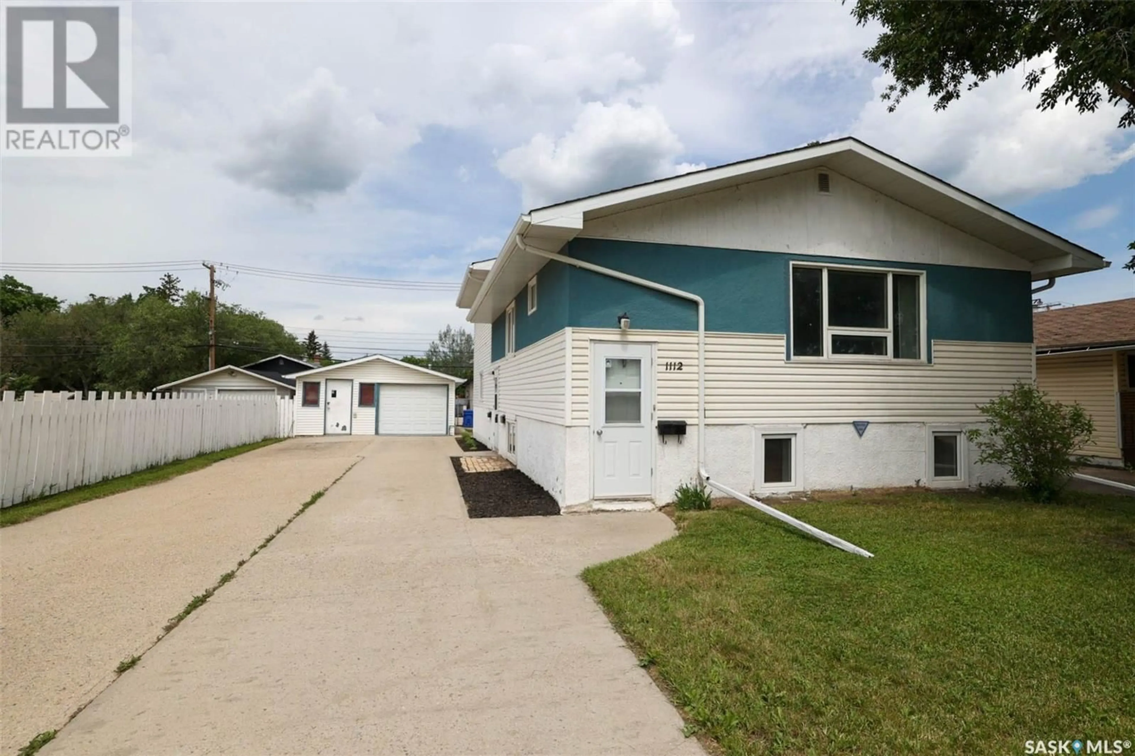 Home with vinyl exterior material, street for E - 1112 DEWDNEY AVENUE, Regina Saskatchewan S4N0E5