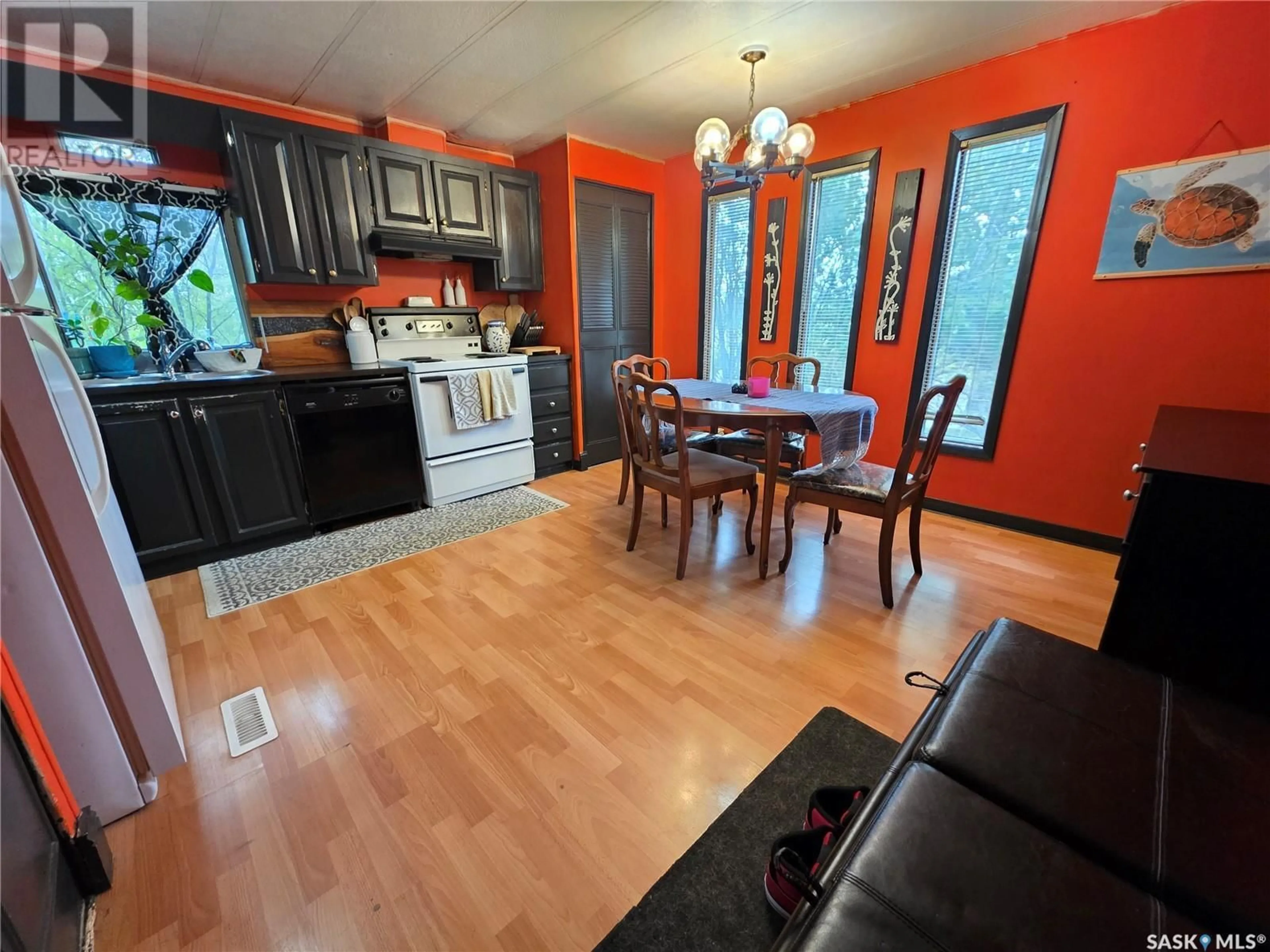 Open concept kitchen, wood/laminate floor for 316 KLASSEN STREET, Herbert Saskatchewan S0H2A0