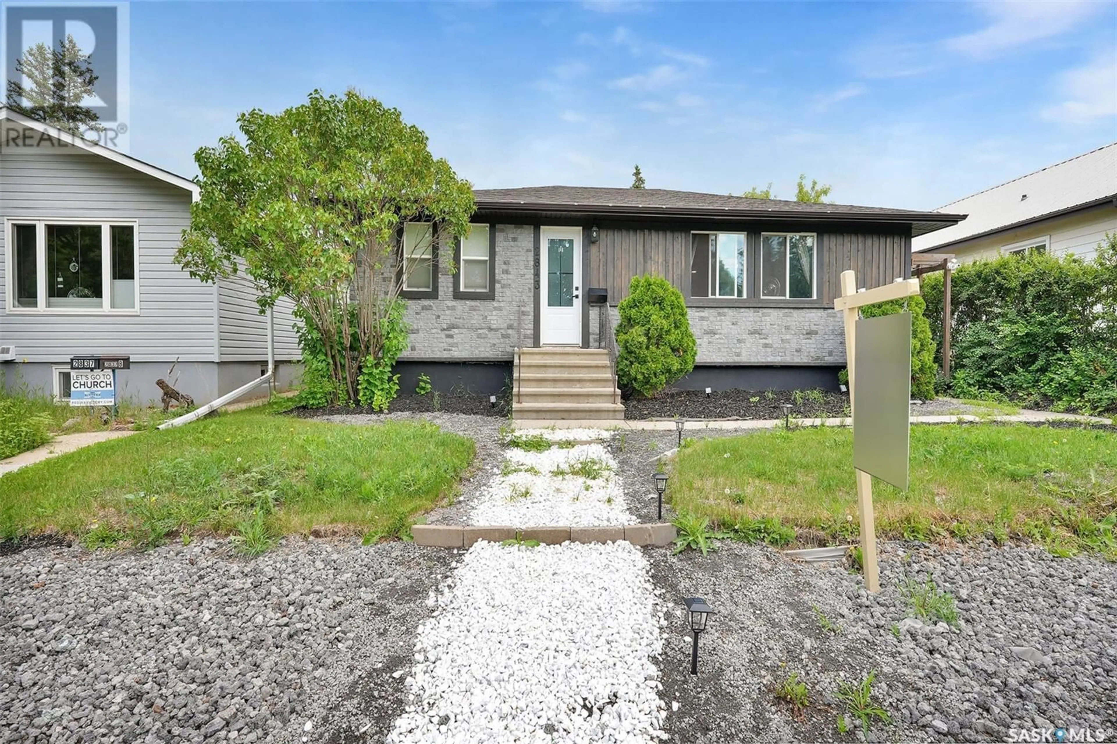 Home with vinyl exterior material, street for 2843 PARK STREET, Regina Saskatchewan S4N2H9