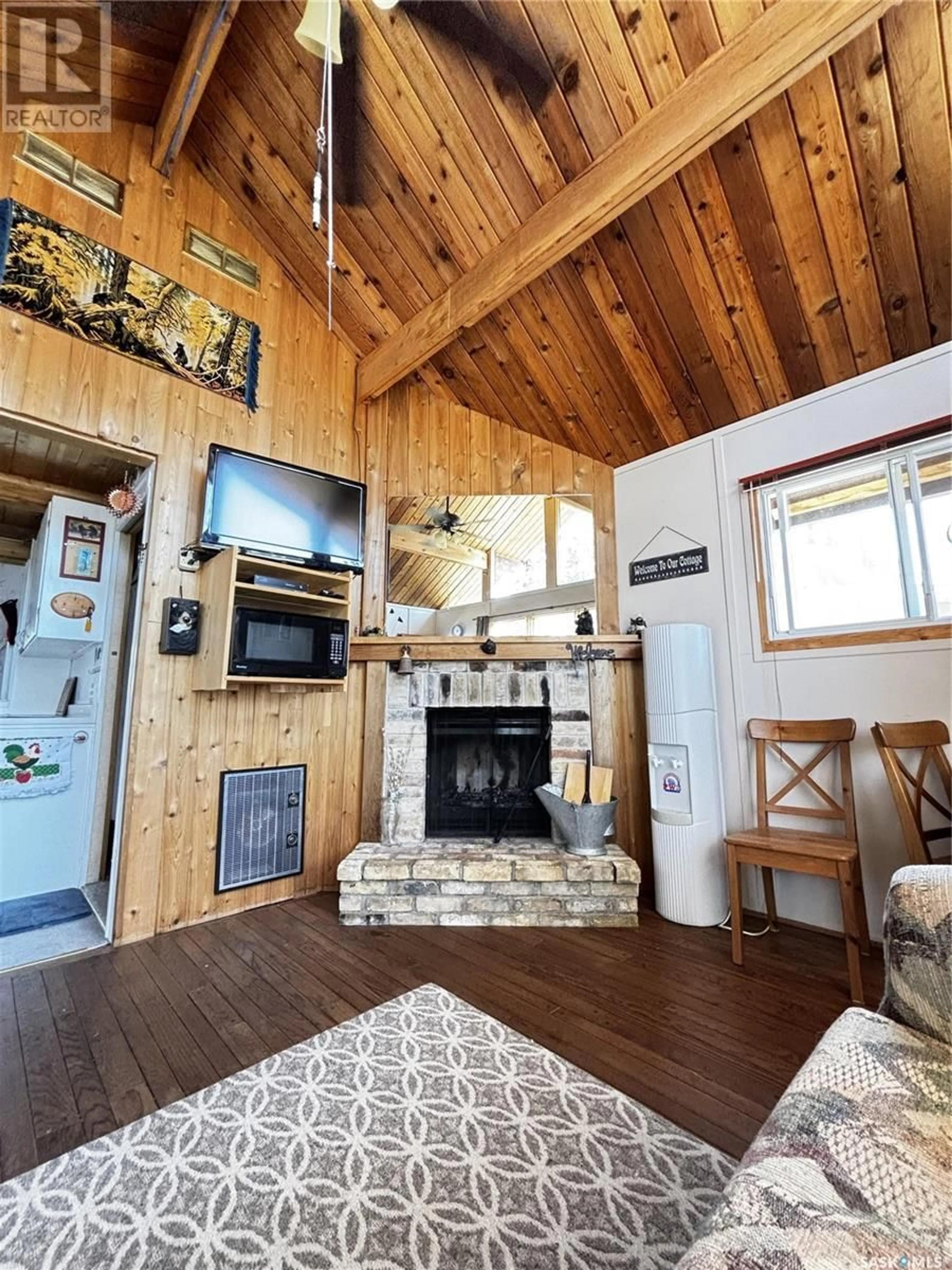 Living room with furniture, wood/laminate floor for 1544 FINCH, Prince Albert National Park Saskatchewan