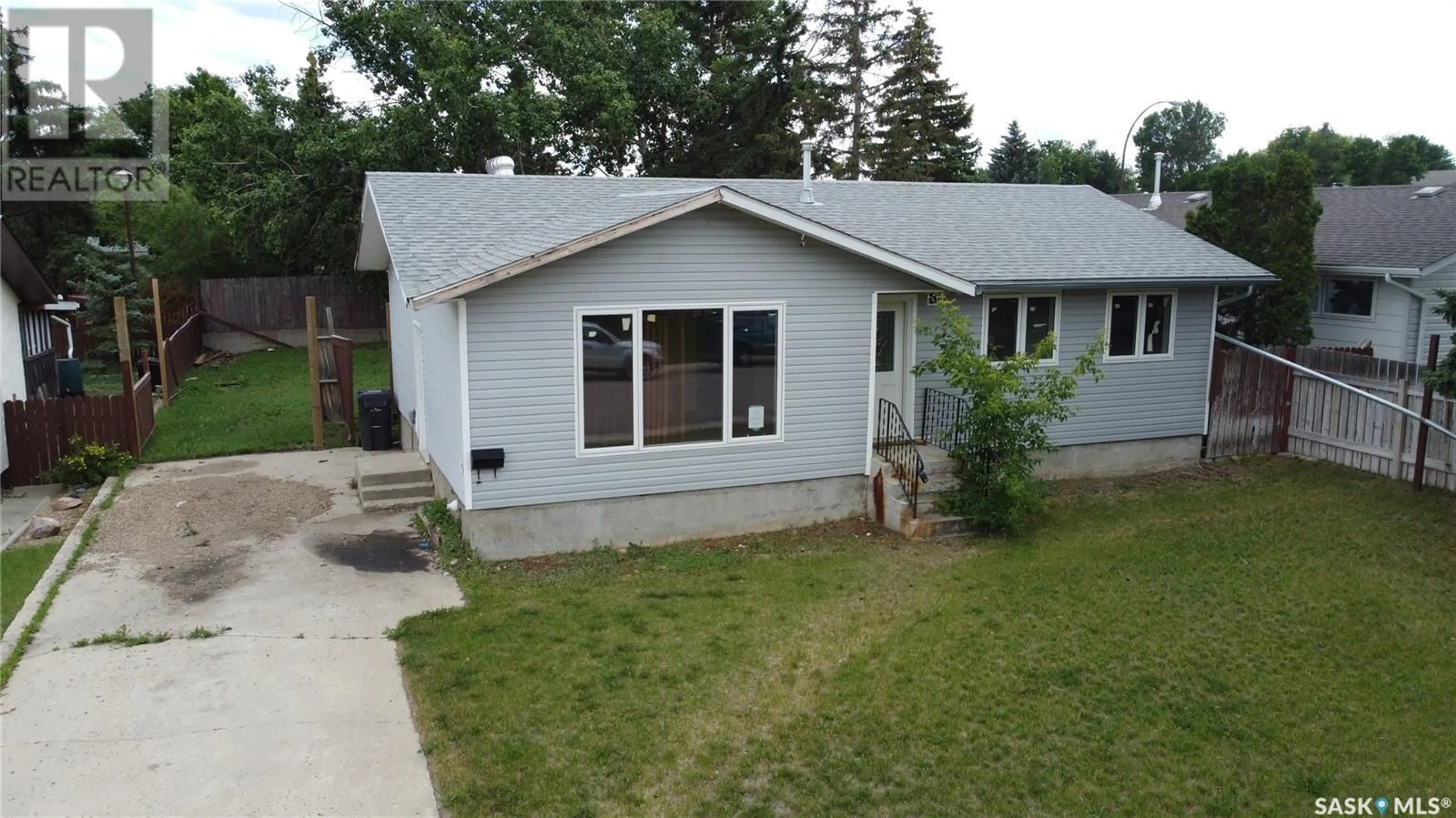 Home with vinyl exterior material, street for 222 TIMS CRESCENT, Swift Current Saskatchewan S9H4K8