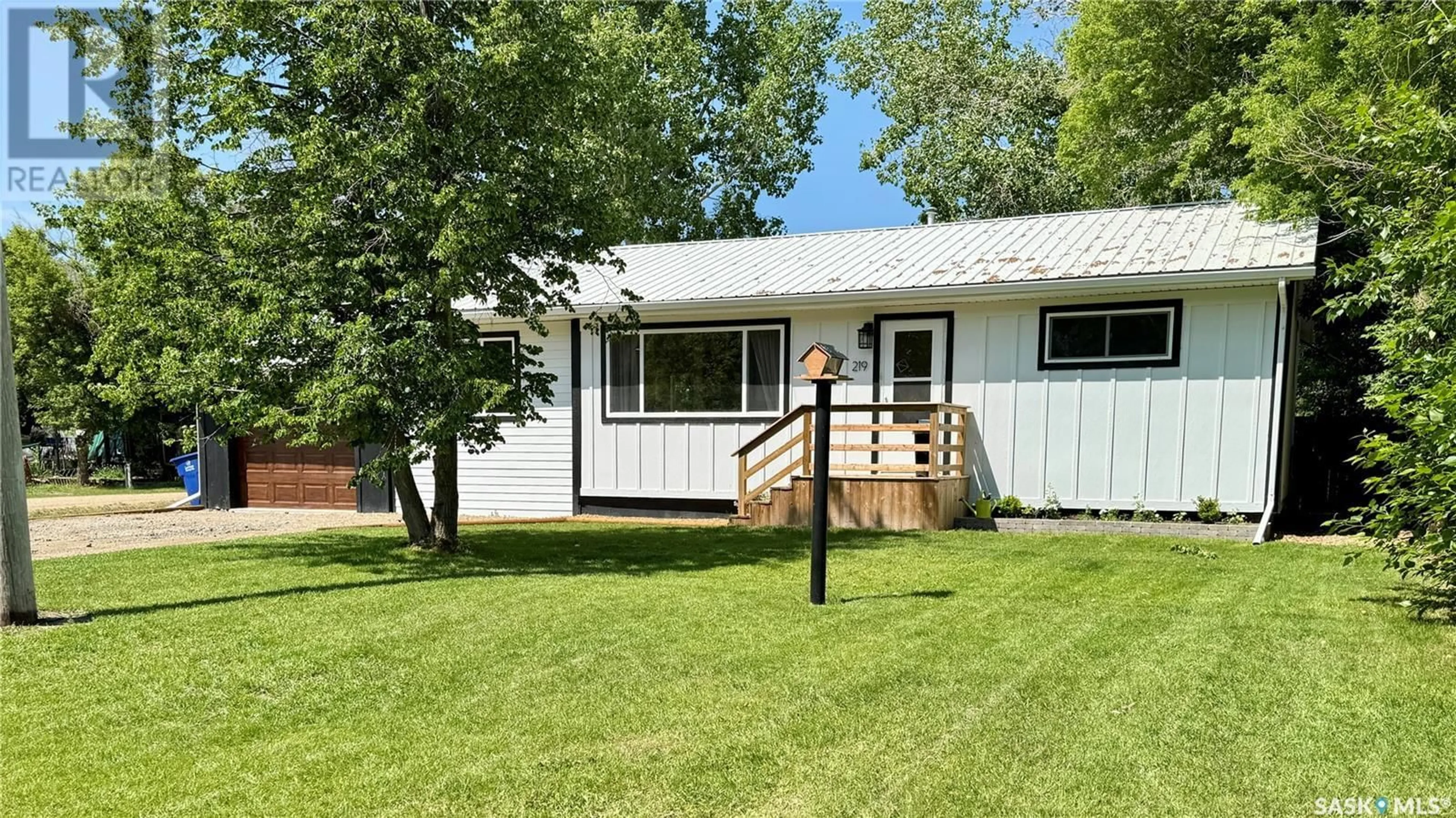 Home with vinyl exterior material, street for 219 KING STREET, Broderick Saskatchewan S0H0L0