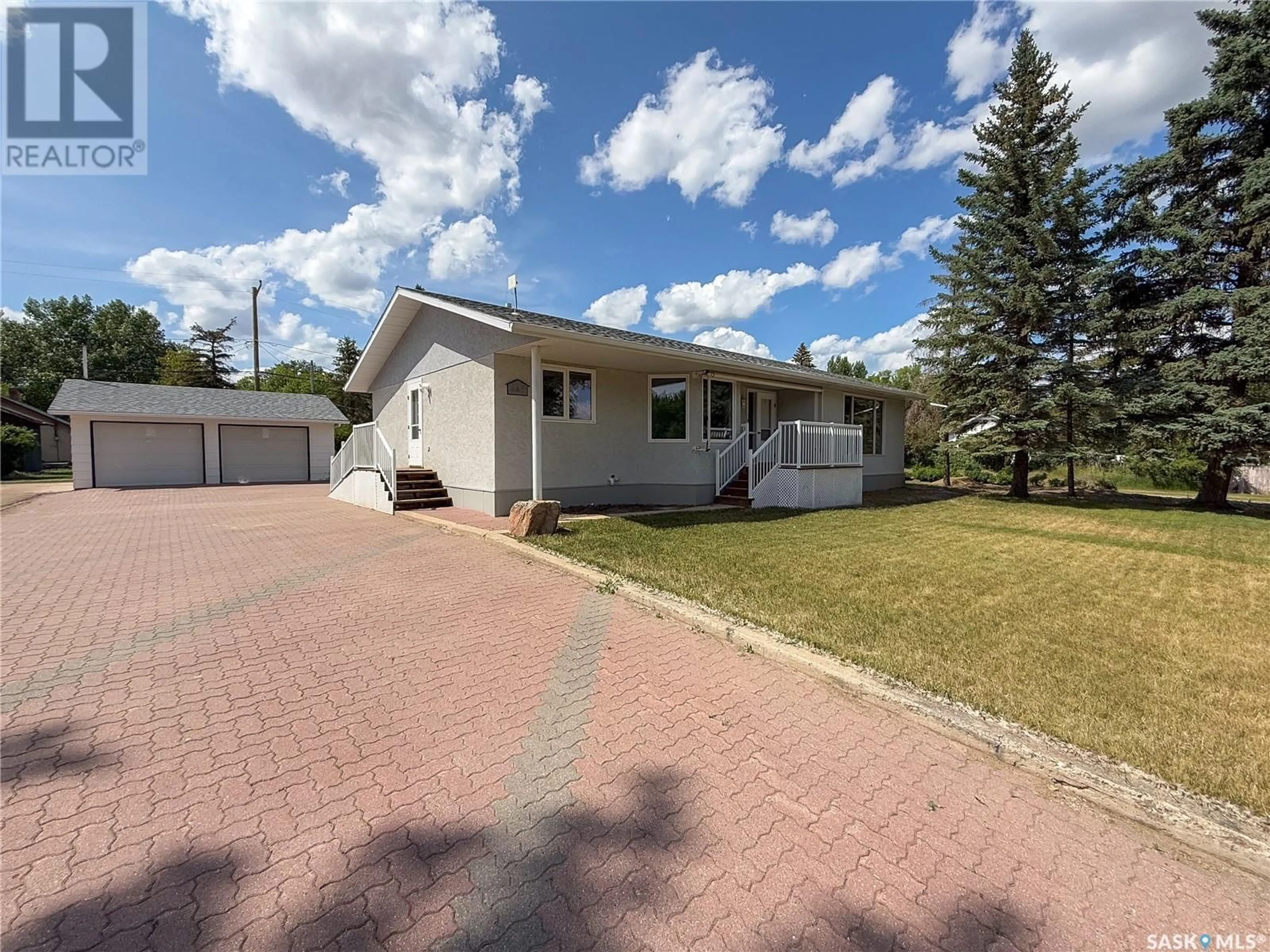 A pic from outside/outdoor area/front of a property/back of a property/a pic from drone, street for 242 CEDAR AVENUE, Eastend Saskatchewan S0N1T0