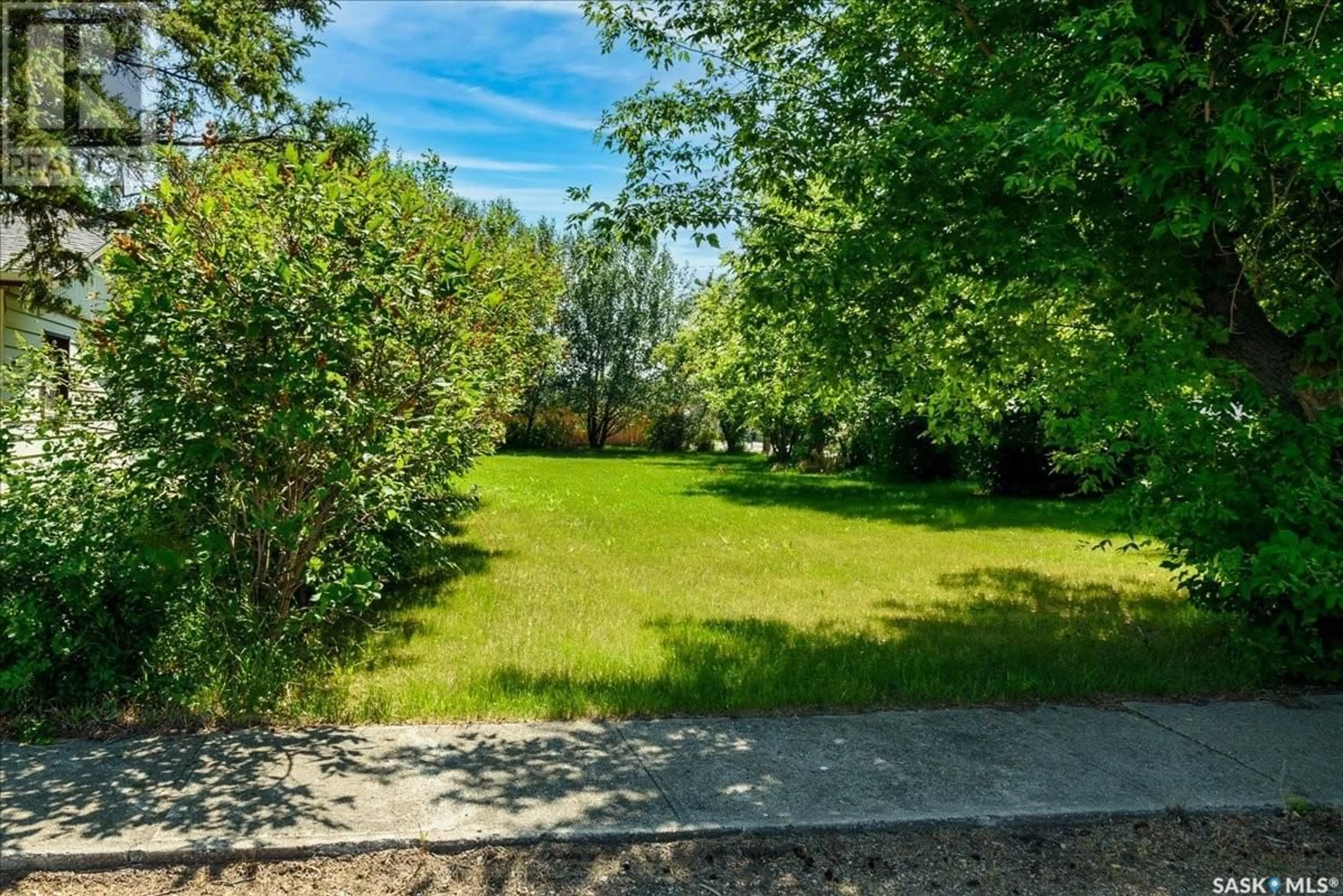 A pic from outside/outdoor area/front of a property/back of a property/a pic from drone, forest/trees view for 115 FIFE STREET, Lipton Saskatchewan S0G3B0