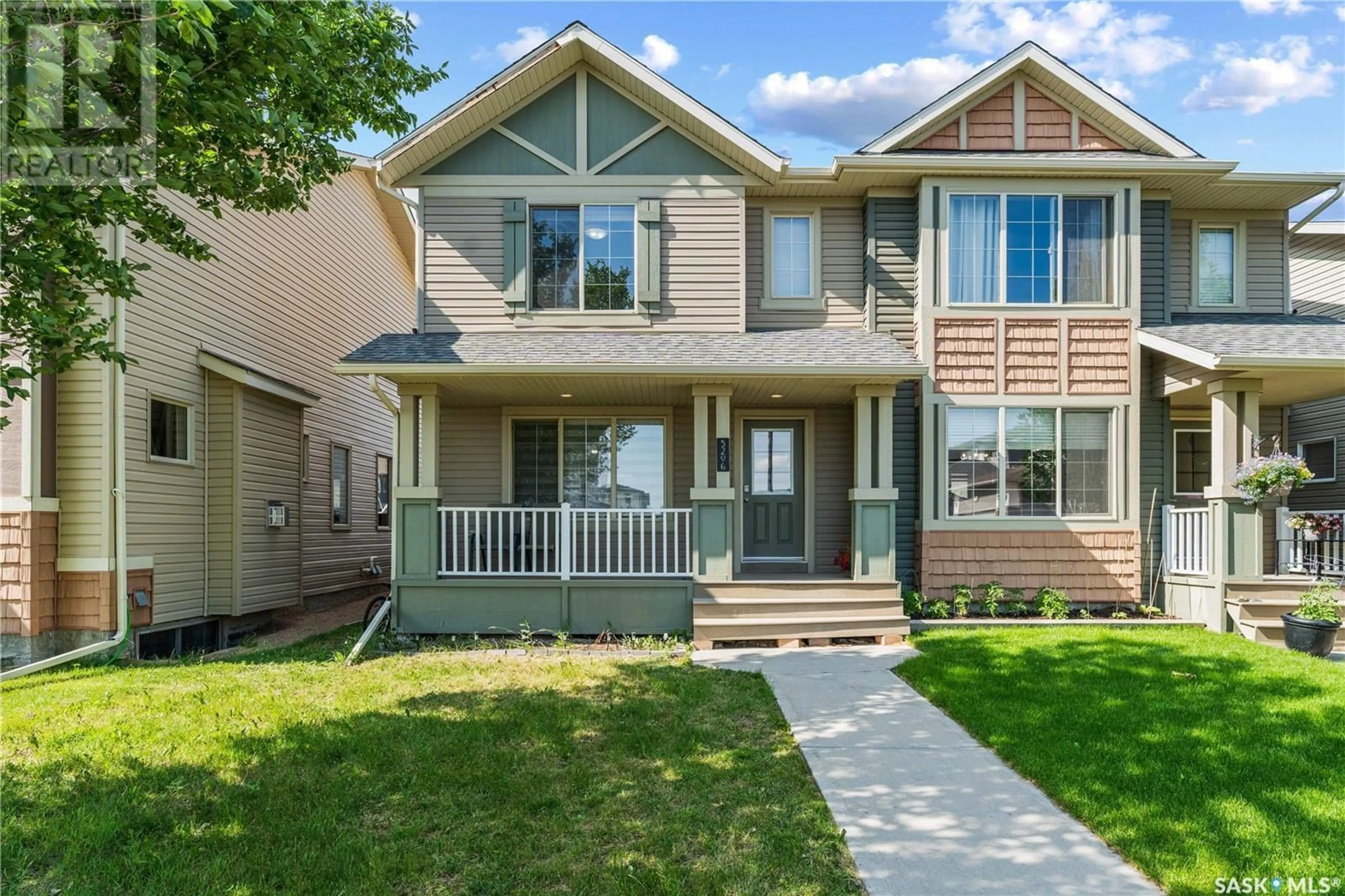 Home with vinyl exterior material, street for 5206 MITCHINSON WAY, Regina Saskatchewan S4W0J9