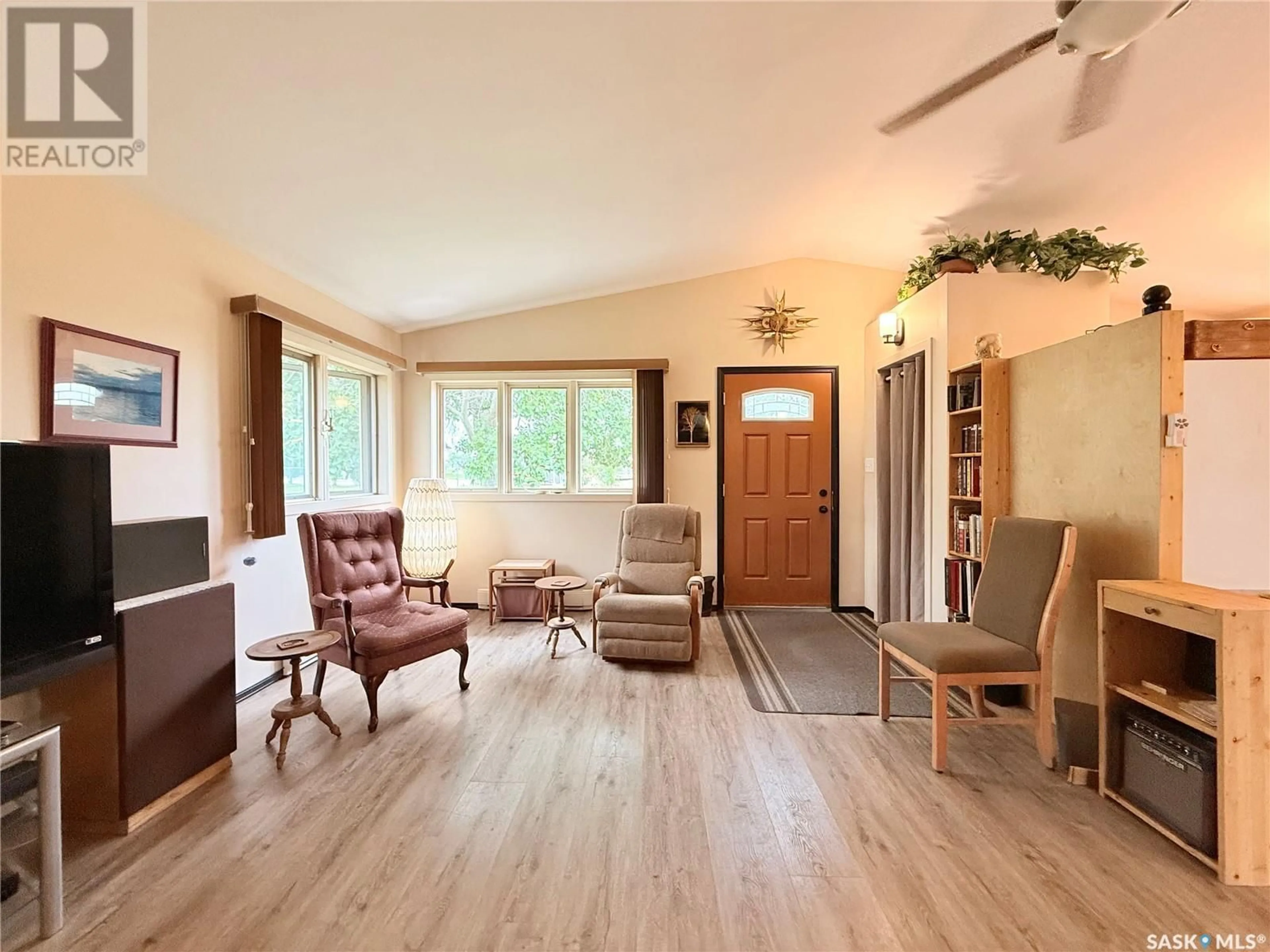 Living room with furniture, wood/laminate floor for 457 2ND AVENUE, Riverhurst Saskatchewan S0H3P0