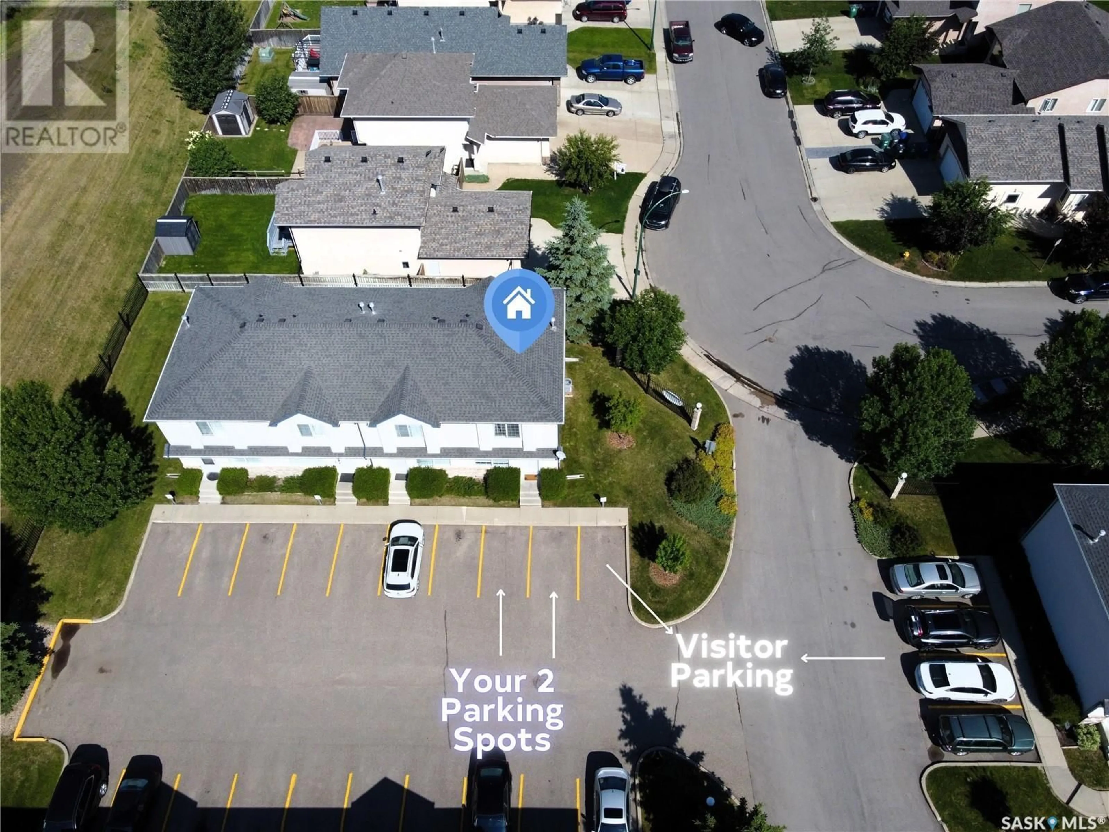 A pic from outside/outdoor area/front of a property/back of a property/a pic from drone, street for 101 663 BECKETT CRESCENT, Saskatoon Saskatchewan S7N4W8