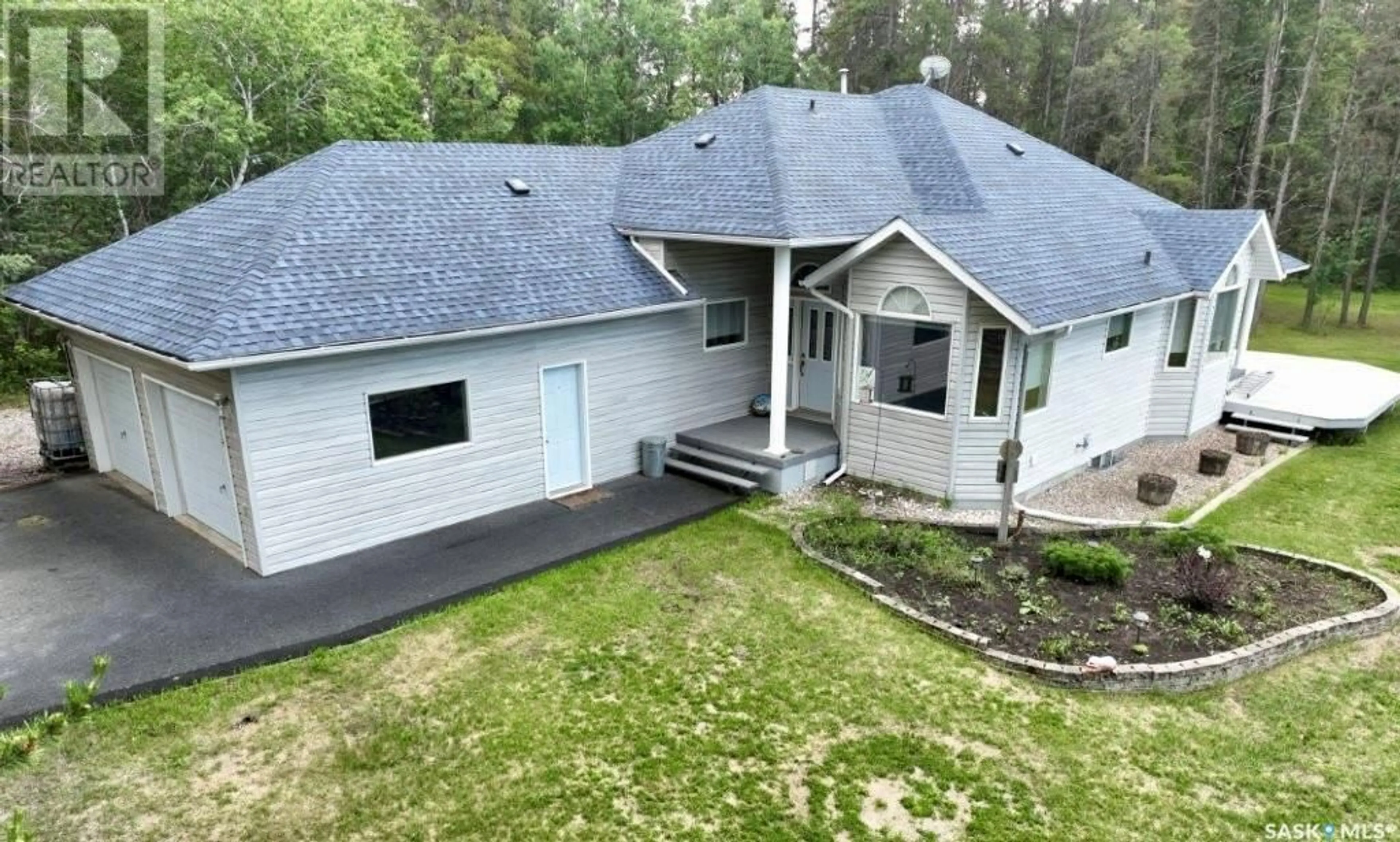 A pic from outside/outdoor area/front of a property/back of a property/a pic from drone, unknown for 1105 HALPIN PLACE, Hudson Bay Saskatchewan S0E0Y0