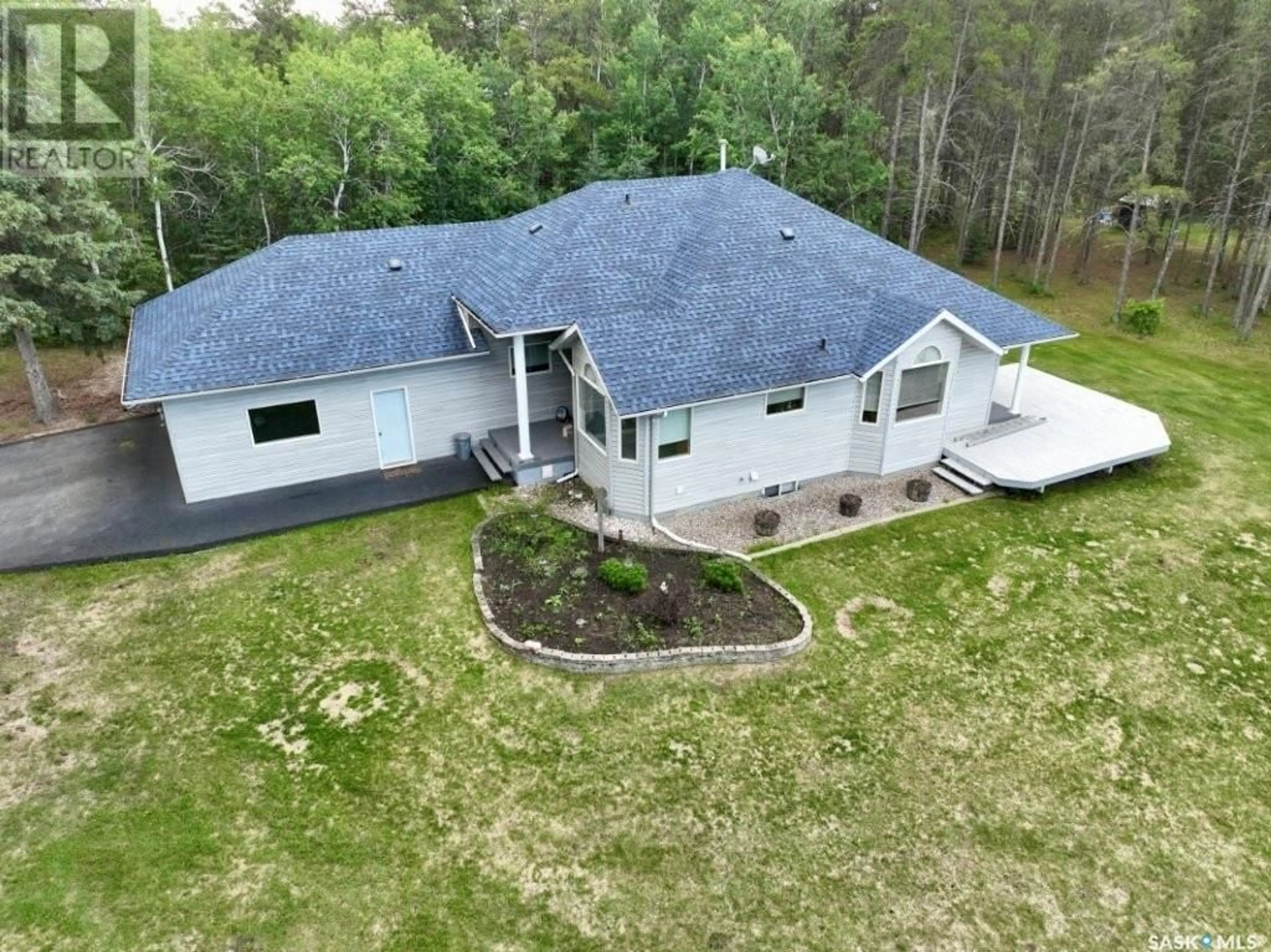 A pic from outside/outdoor area/front of a property/back of a property/a pic from drone, unknown for 1105 HALPIN PLACE, Hudson Bay Saskatchewan S0E0Y0