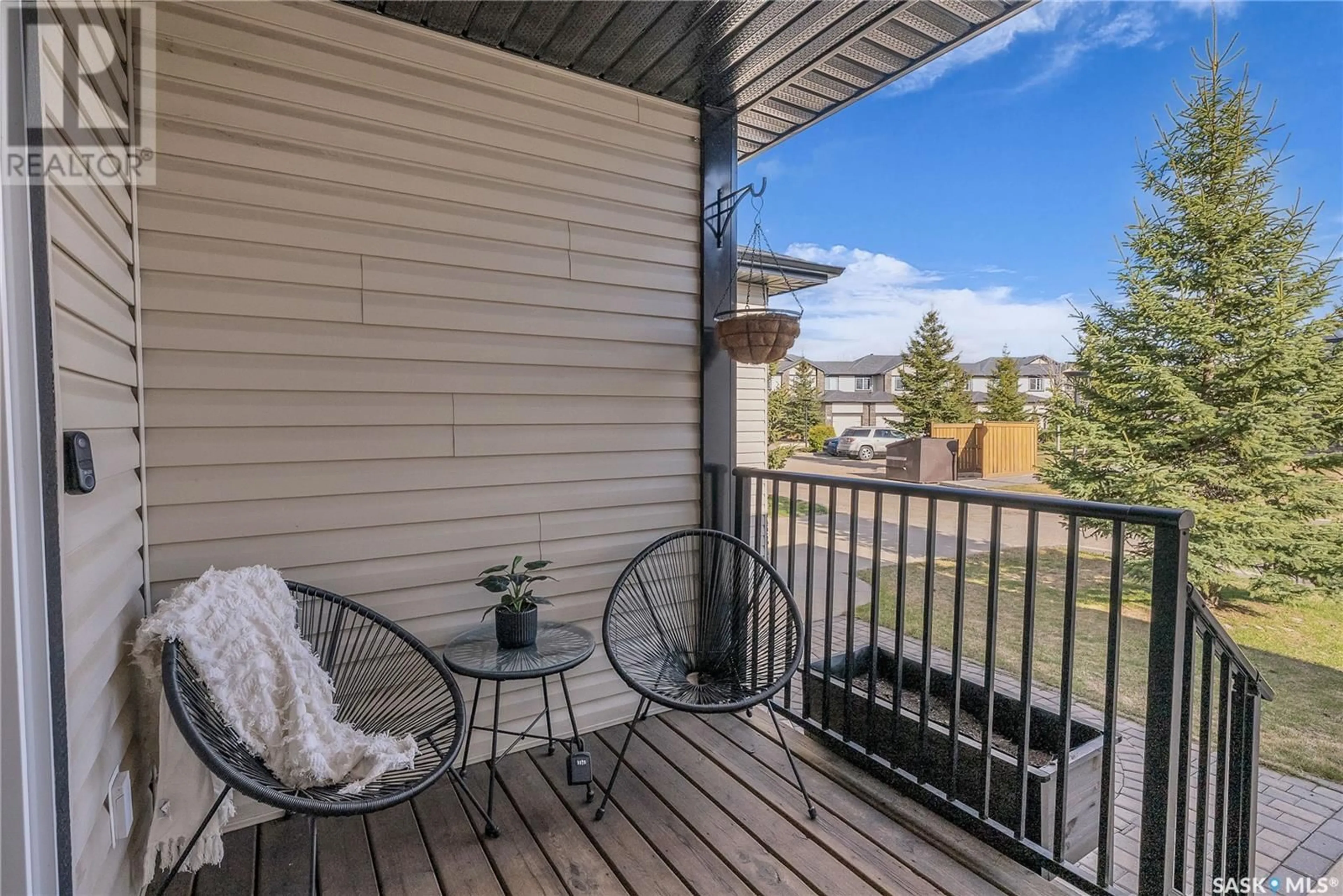 Patio, water/lake/river/ocean view for 215 - 18 HAMPTON GREEN, Saskatoon Saskatchewan S7R0G7