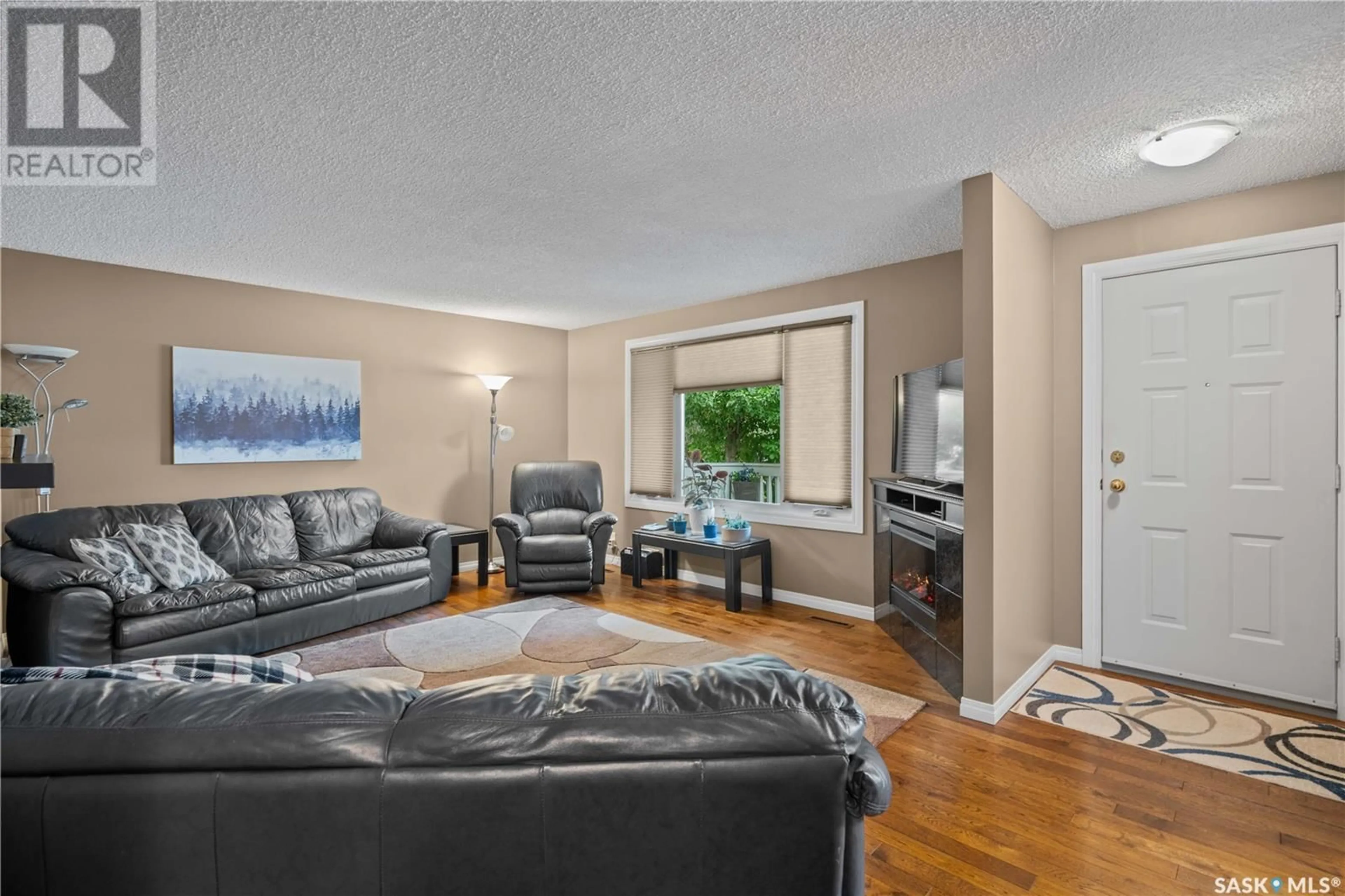 Living room with furniture, unknown for 70 HAMMOND ROAD, Regina Saskatchewan S4V3A7