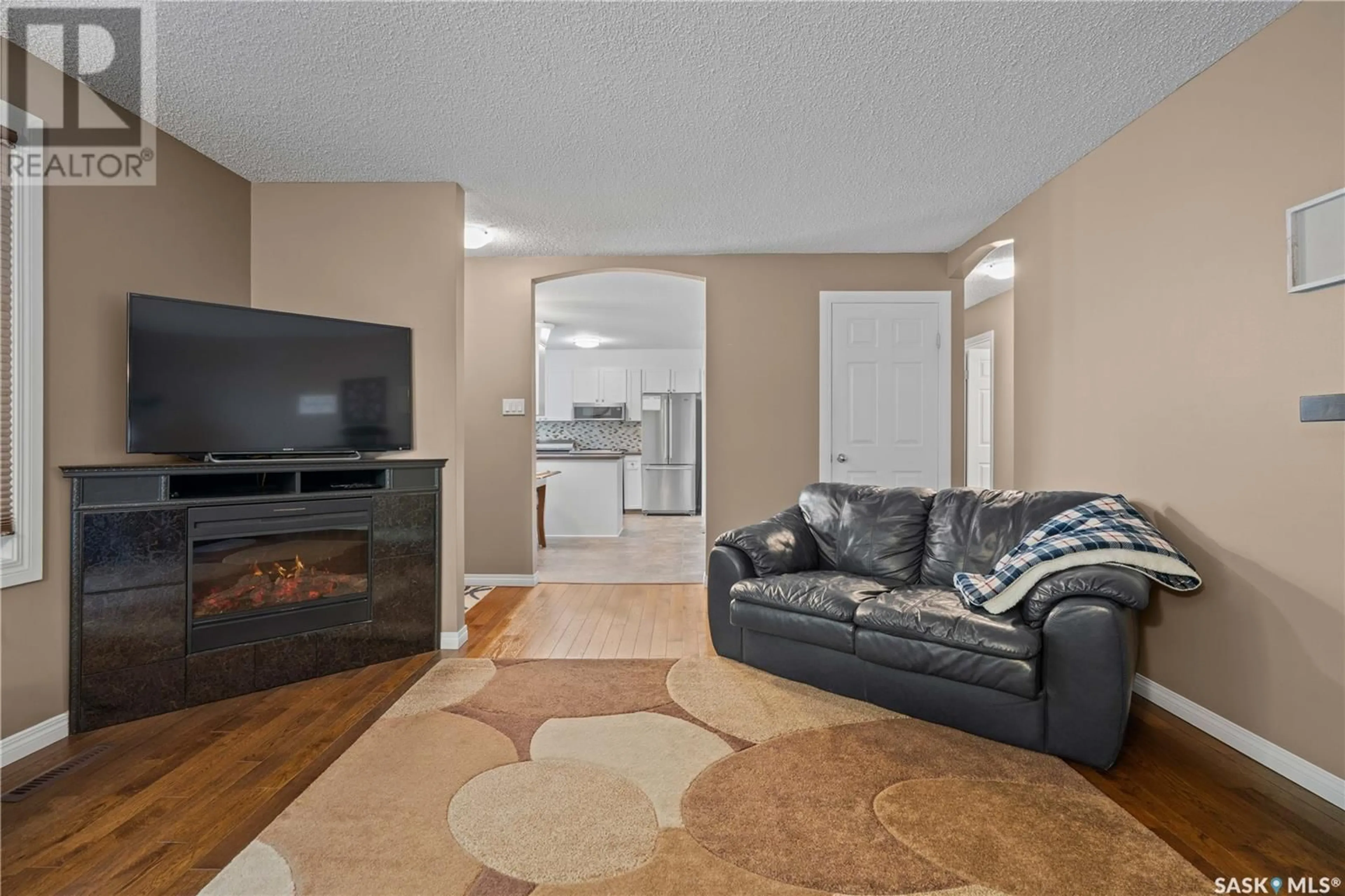 Living room with furniture, unknown for 70 HAMMOND ROAD, Regina Saskatchewan S4V3A7