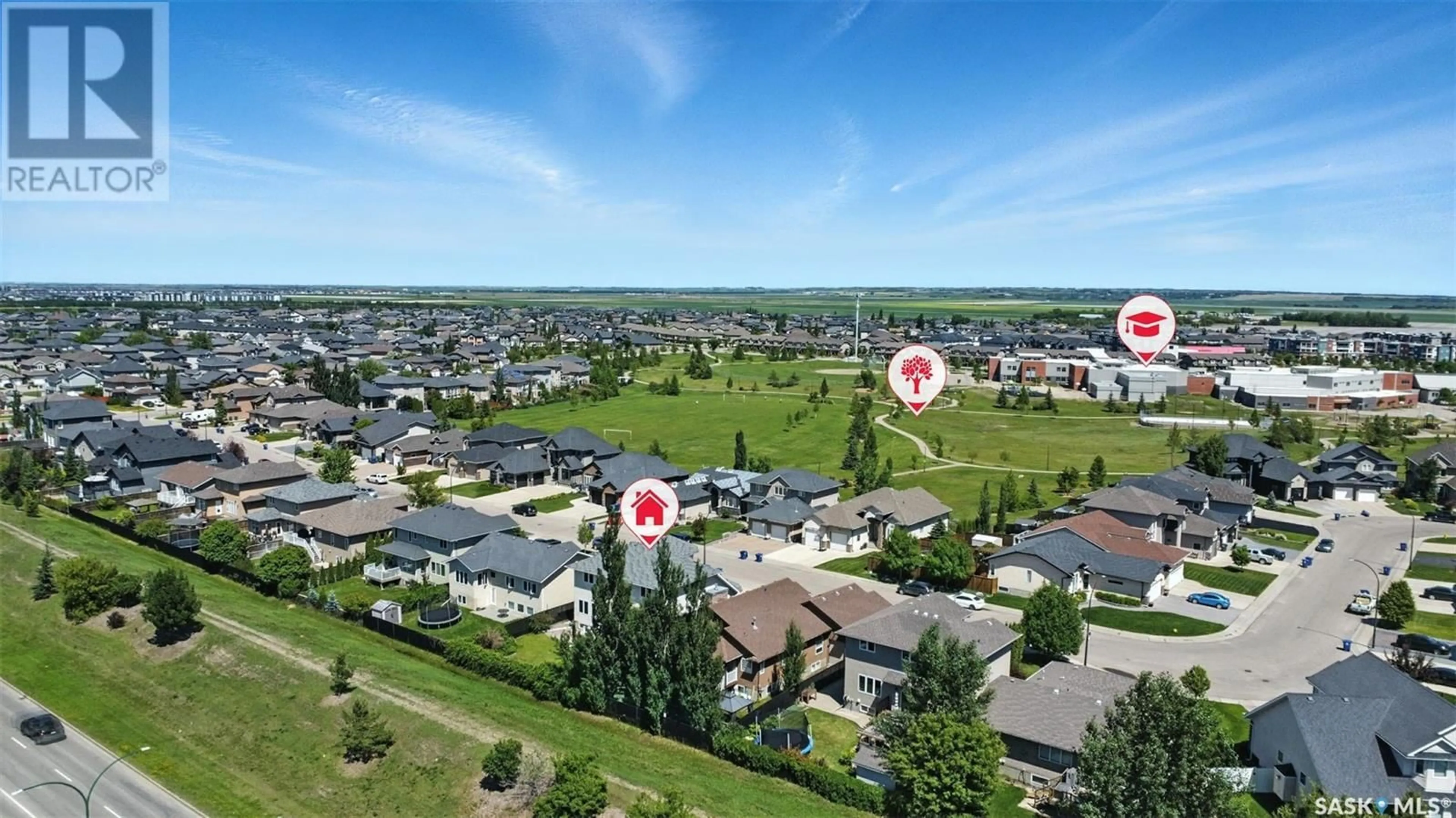 A pic from outside/outdoor area/front of a property/back of a property/a pic from drone, water/lake/river/ocean view for 319 THODE AVENUE, Saskatoon Saskatchewan S7W1A1