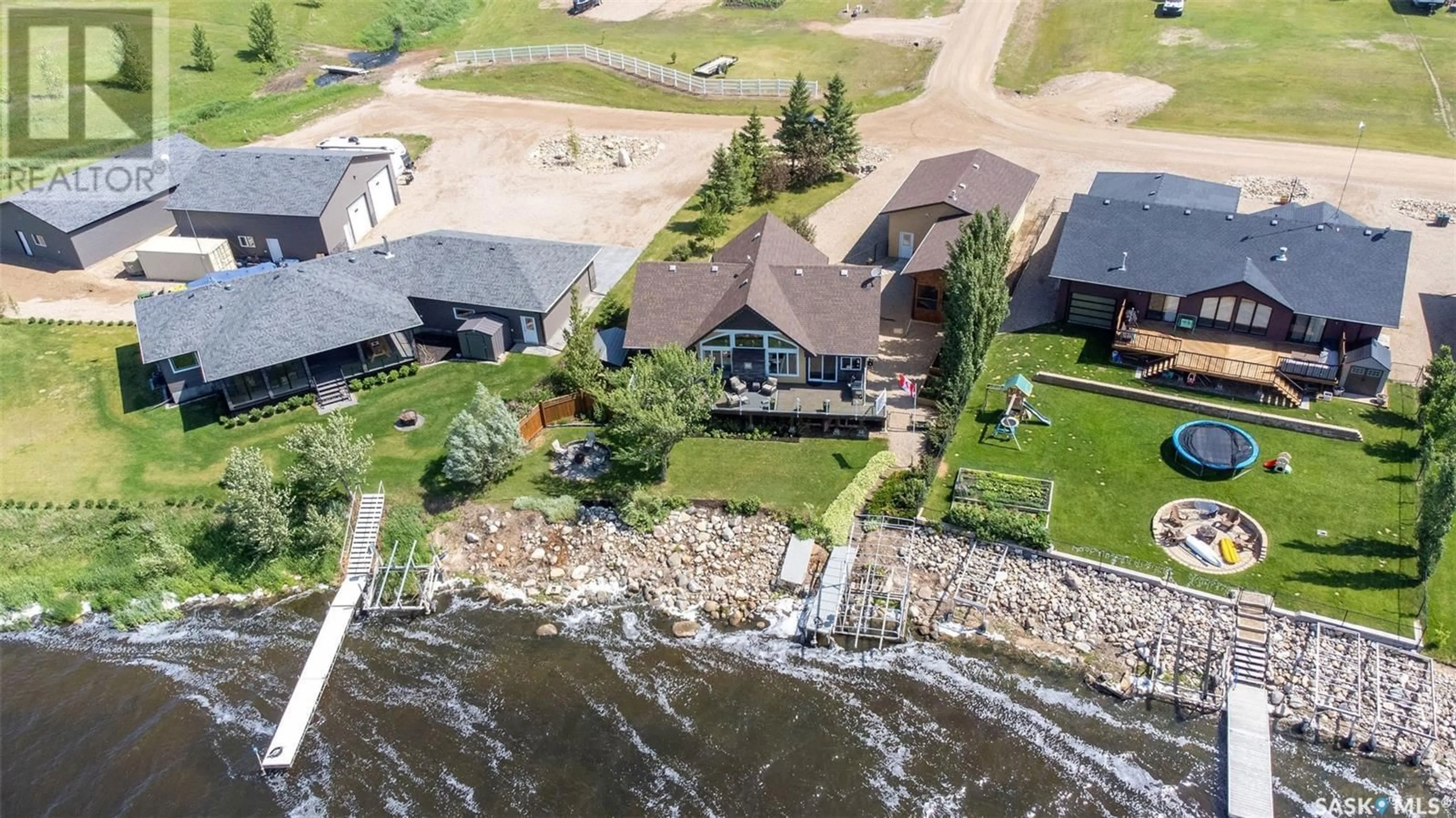 A pic from outside/outdoor area/front of a property/back of a property/a pic from drone, water/lake/river/ocean view for 14 PAPE ROAD, Humboldt Saskatchewan S0K2A0